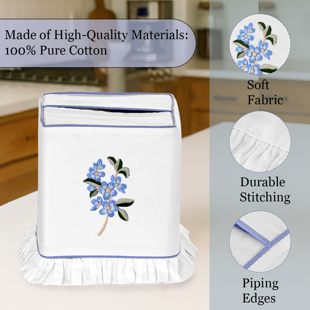 White towel holder with floral design in a kitchen setting, featuring high-quality materials text.