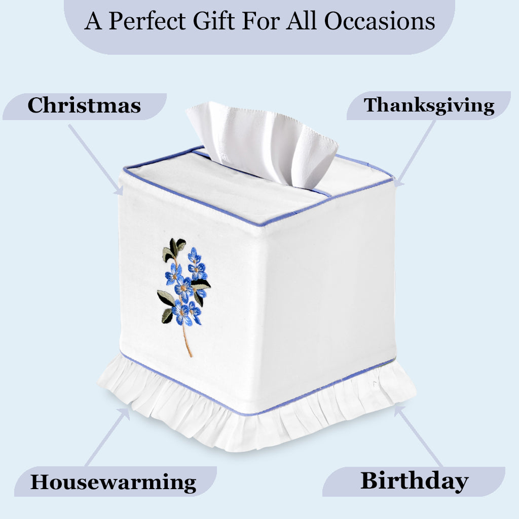 Tissue box cover with floral design on a light blue background, labeled for various occasions.