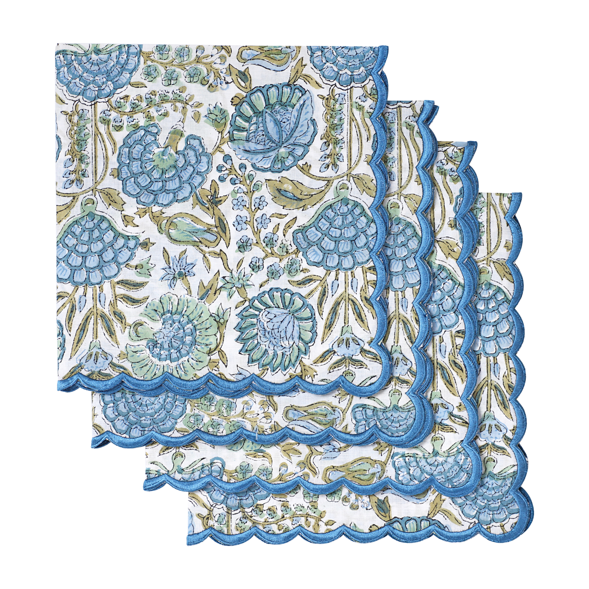 Floral patterned napkin with scalloped edge on a white background