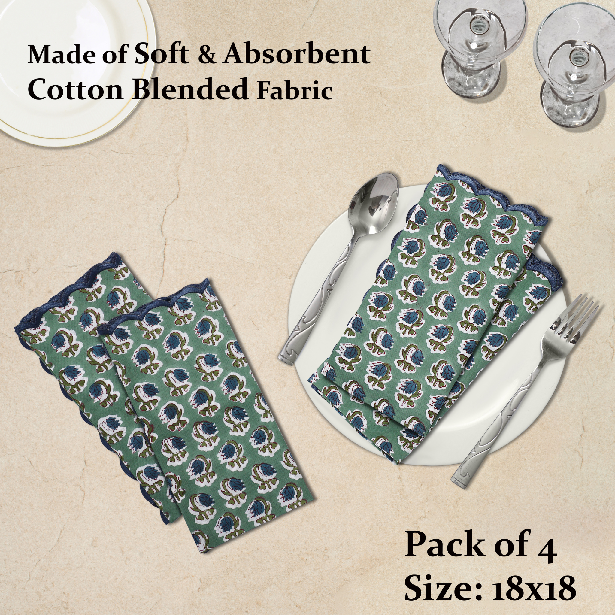 Set of green patterned napkins on a beige surface with cutlery.