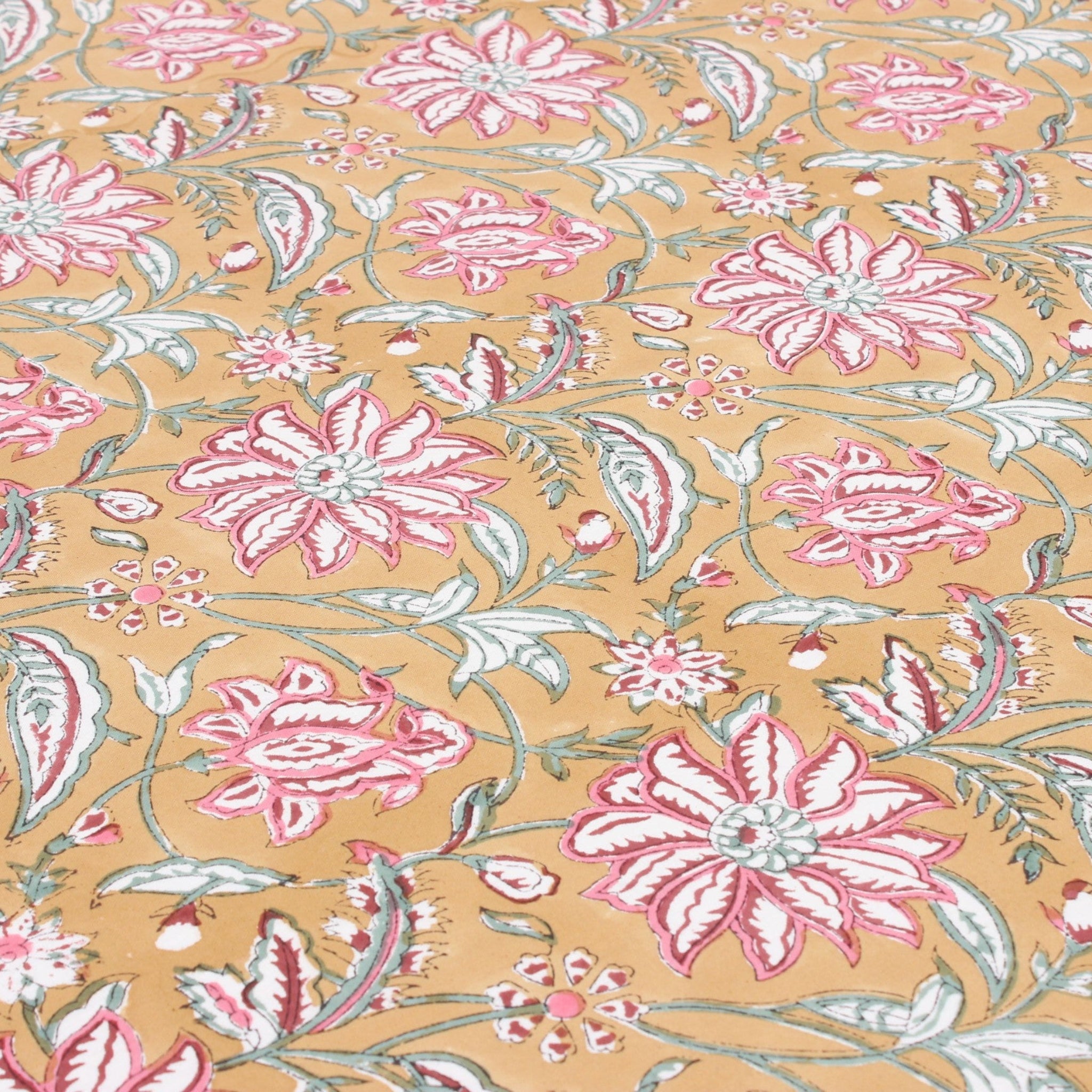 Floral pattern with pink flowers and green leaves on a beige background