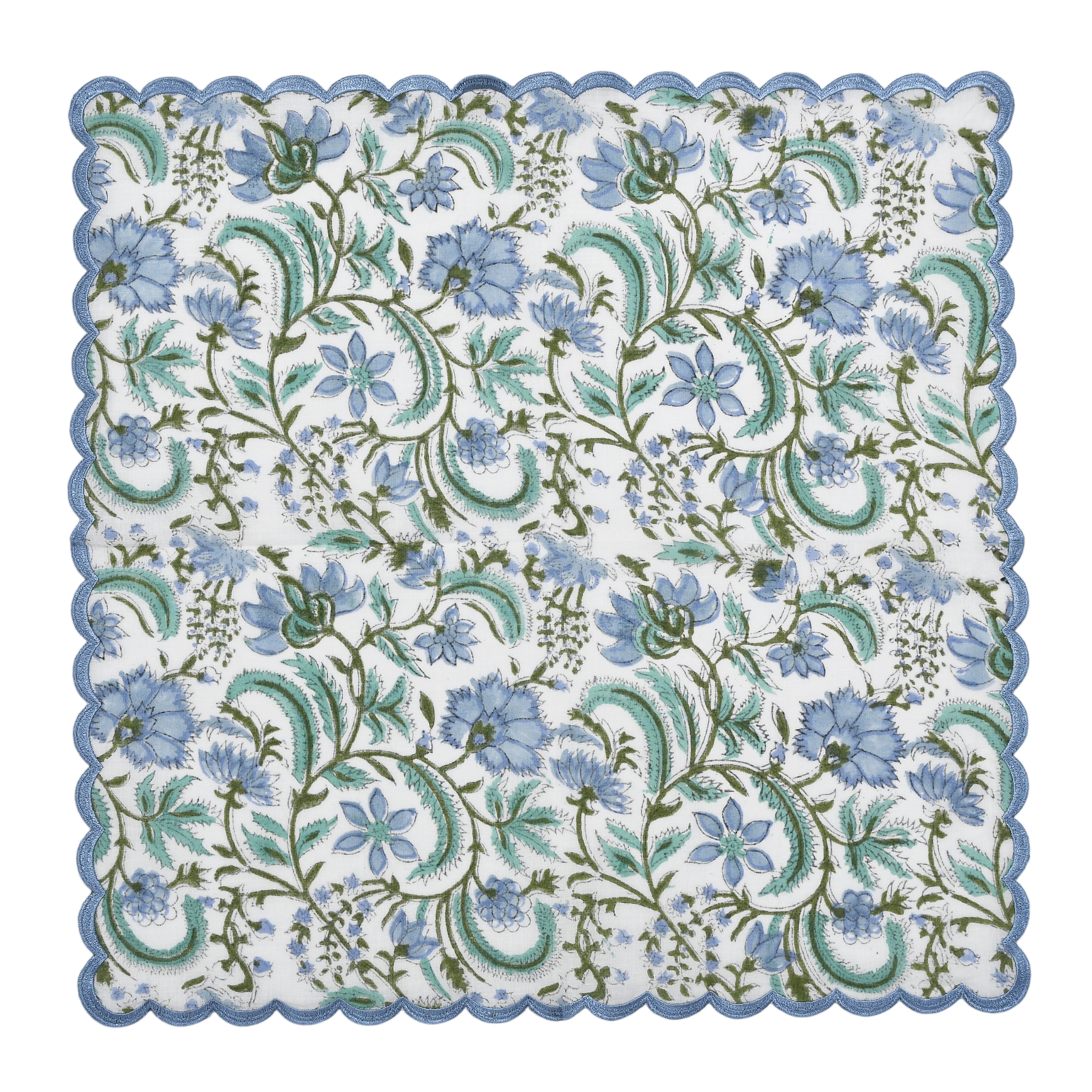 Floral patterned paper with blue flowers and green leaves on a white background