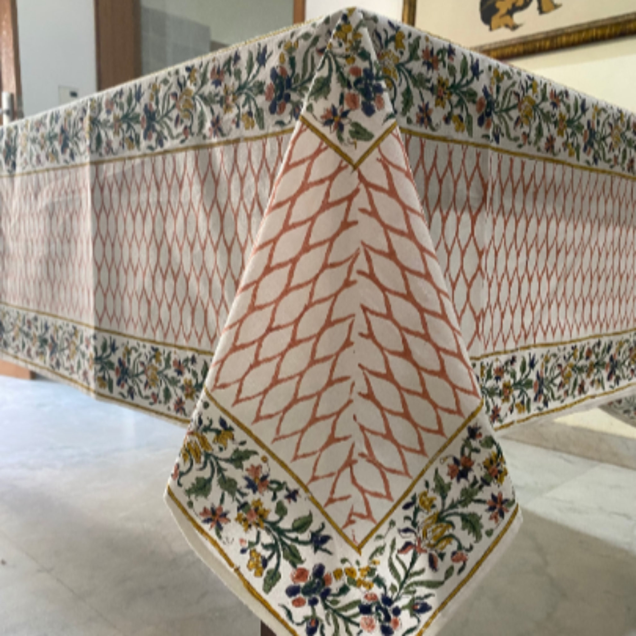 Decorative tablecloth with intricate patterns on a table
