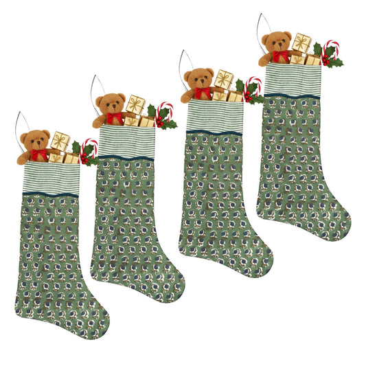 Three green Christmas stockings with teddy bears and presents on a white background