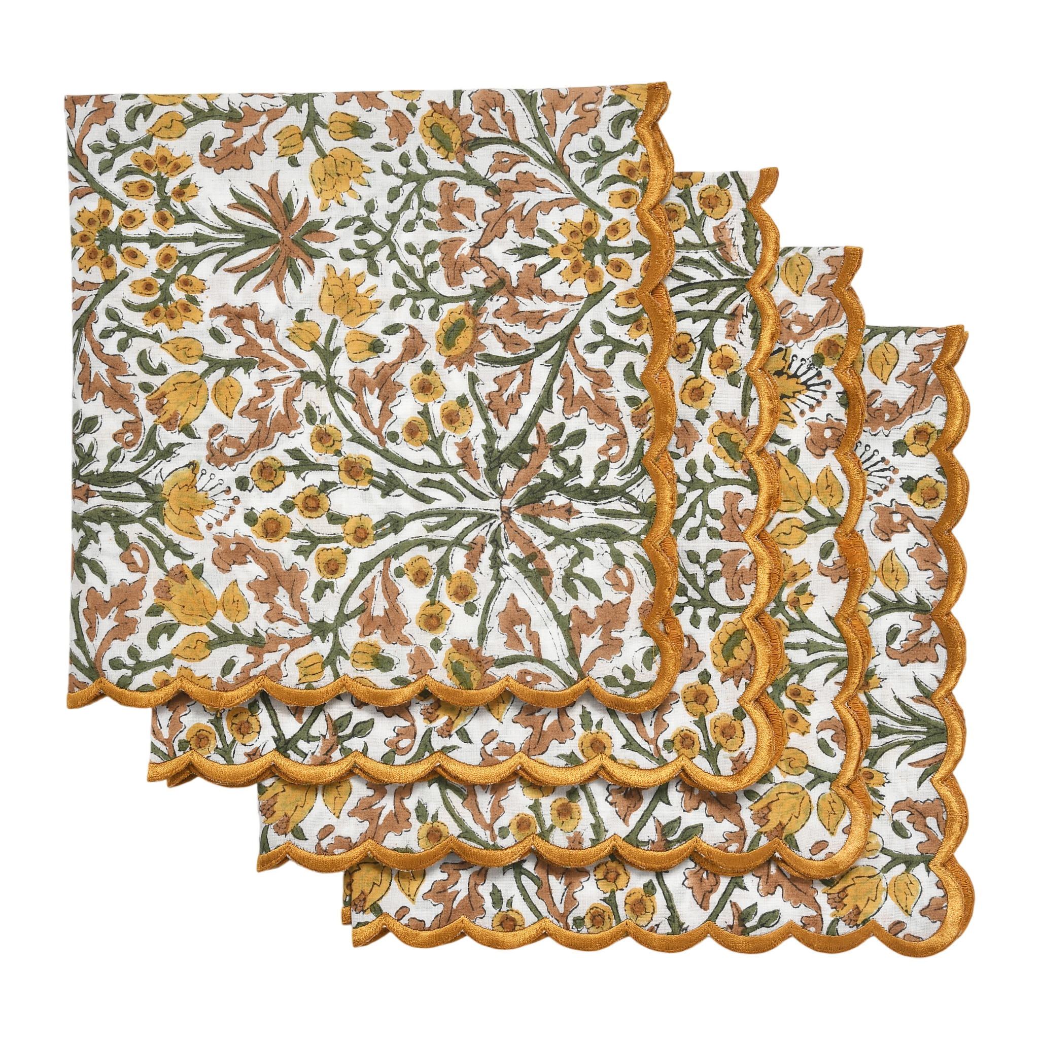 Set of floral patterned placemats with scalloped edge on a white background