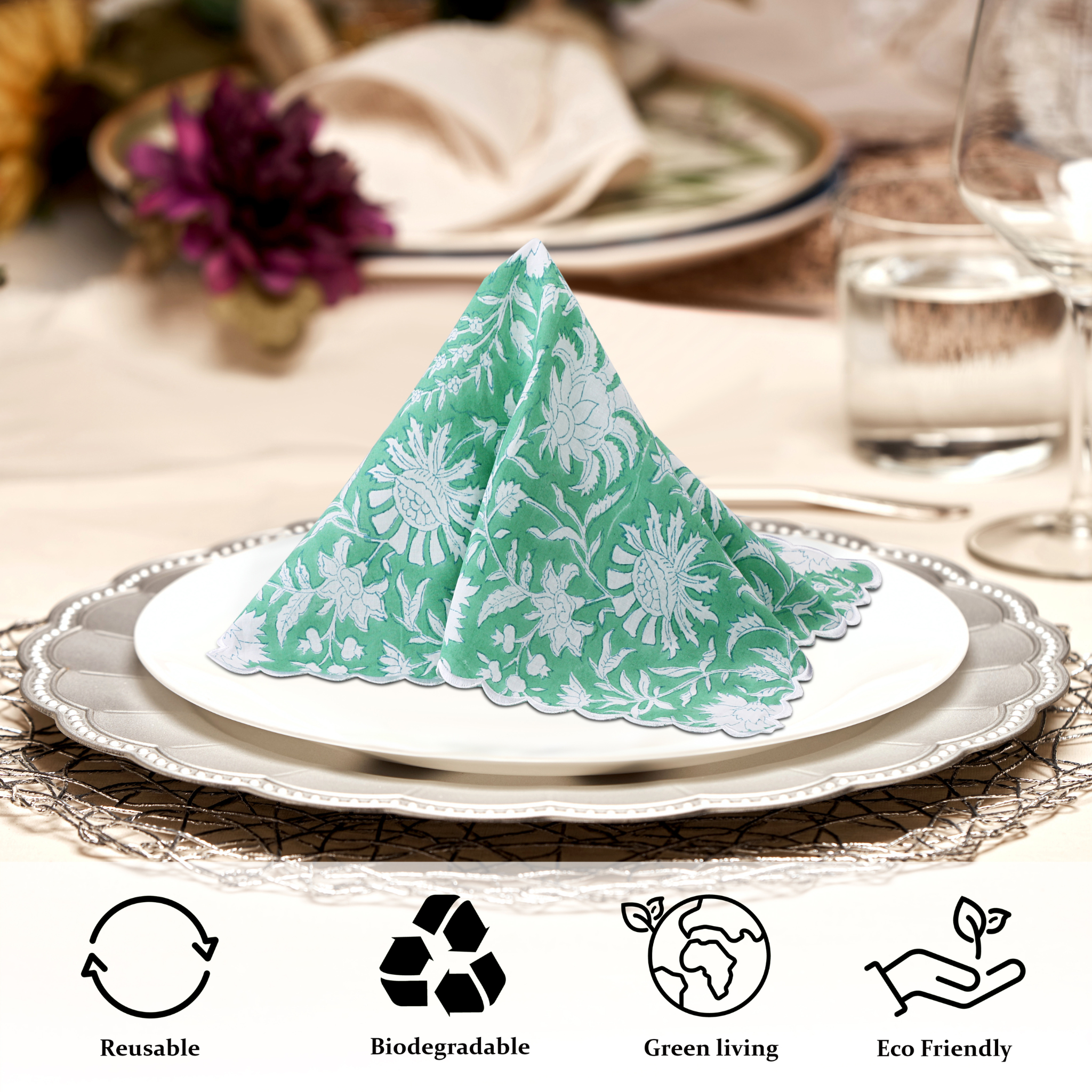 Green and white patterned napkin on a plate with table setting and eco-friendly icons.