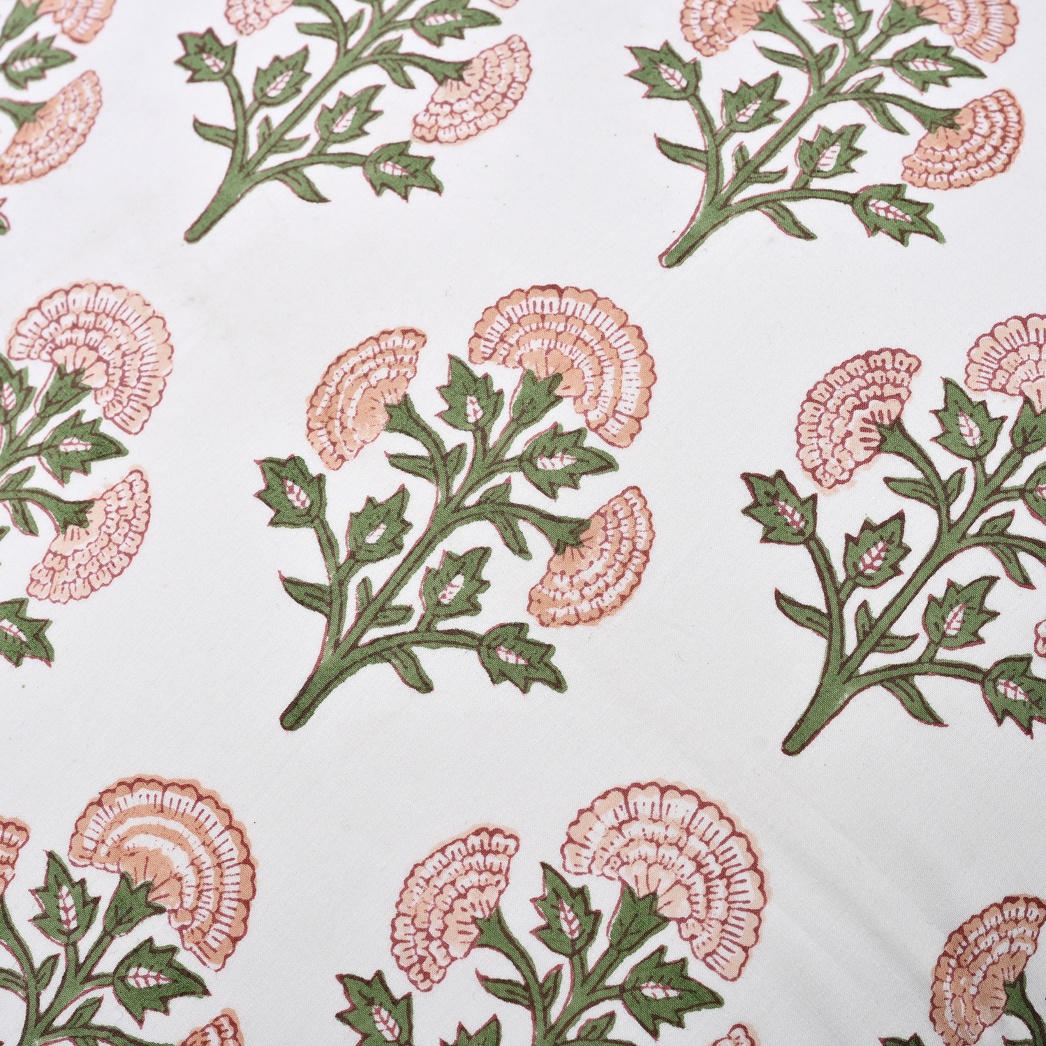 Pattern of pink flowers and green leaves on a white background
