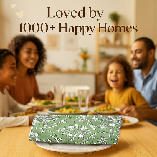 Family enjoying a meal together with a green floral-patterned box in the foreground.