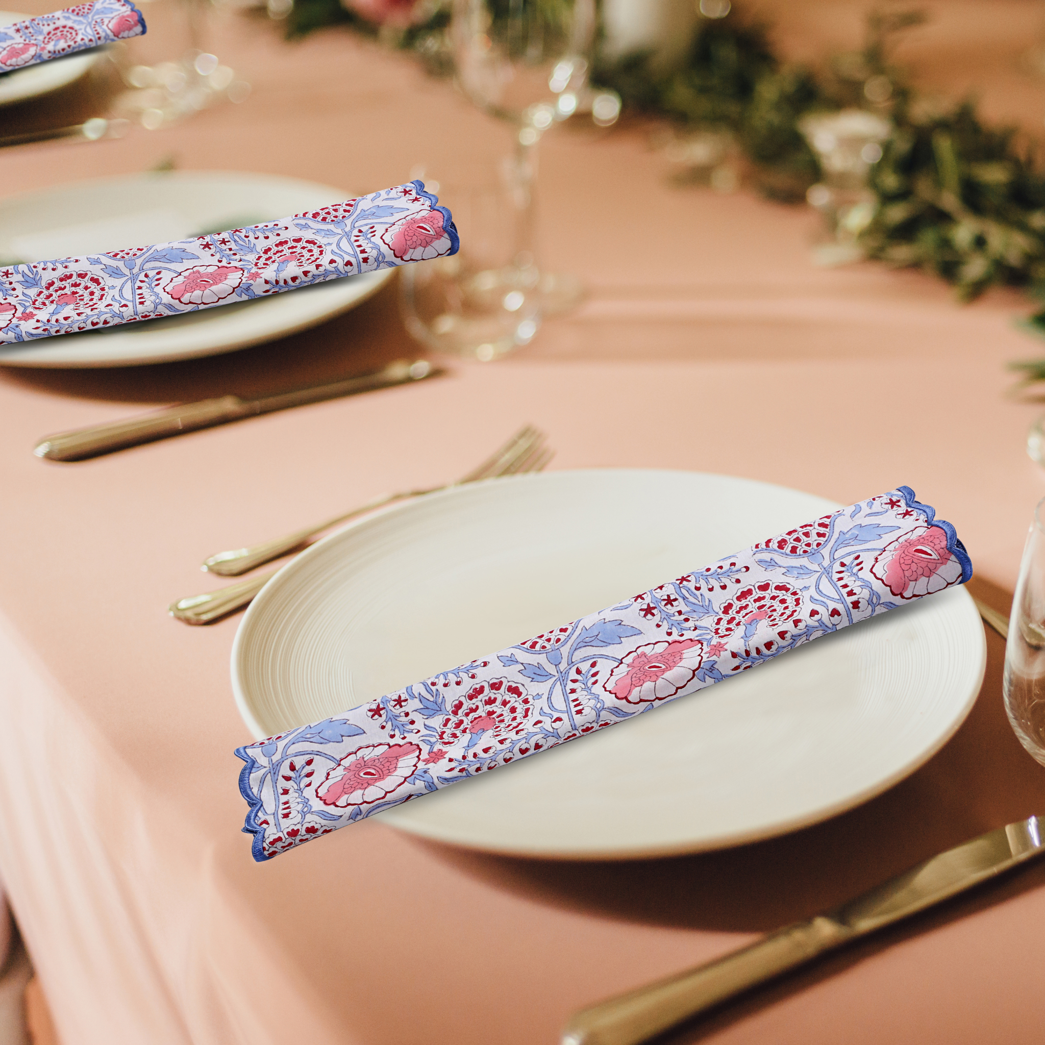 Decorative napkin with floral pattern on a table setting