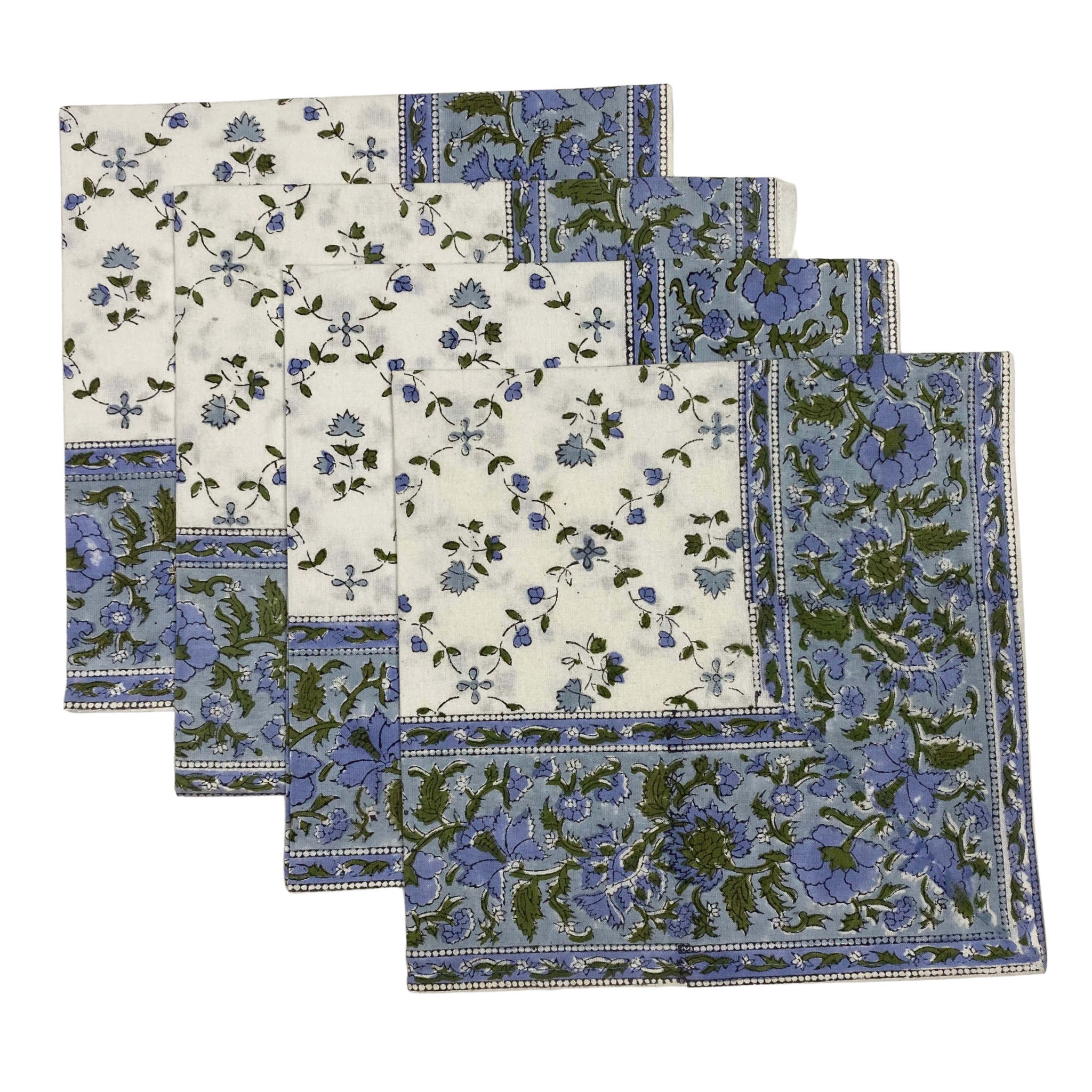 Set of floral patterned placemats on a white background