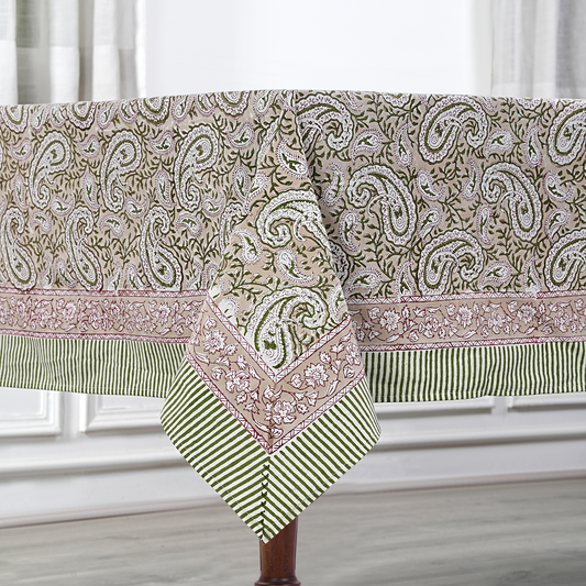 Patterned tablecloth with paisley design on a white surface