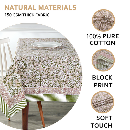 Tablecloth with paisley pattern on a table, featuring text about natural materials and fabric details.