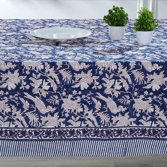 Tablecloth with blue and white floral pattern on a dining table.