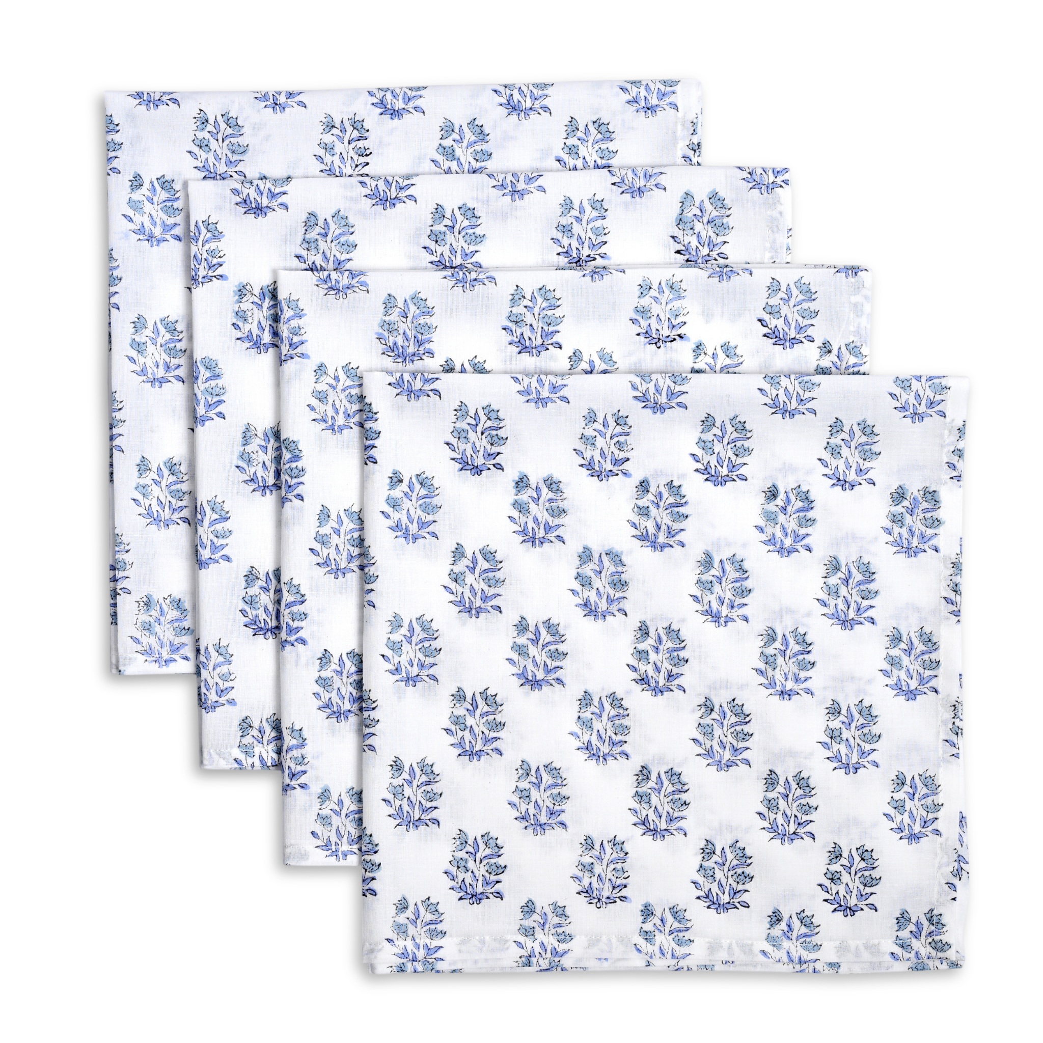 Set of four blue floral patterned napkins on a white background