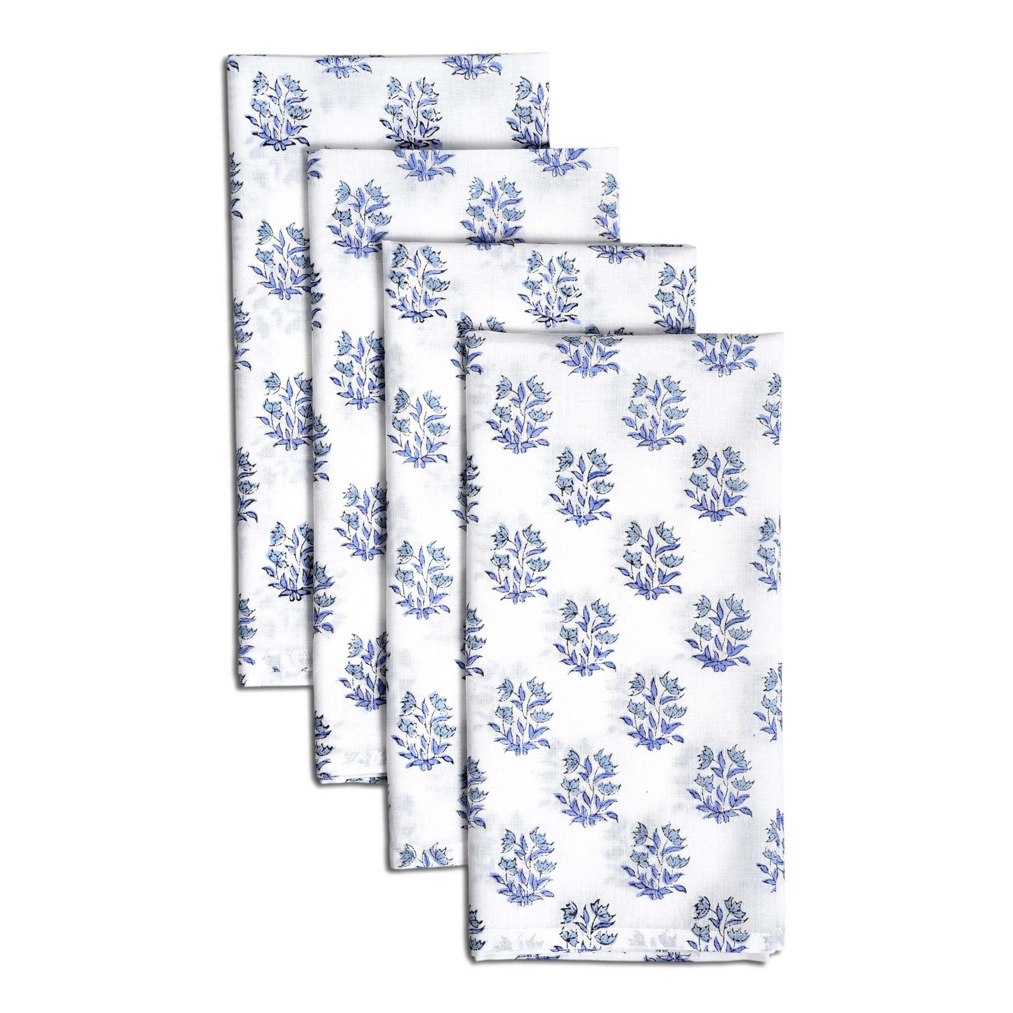 Set of four floral-patterned napkins on a white background