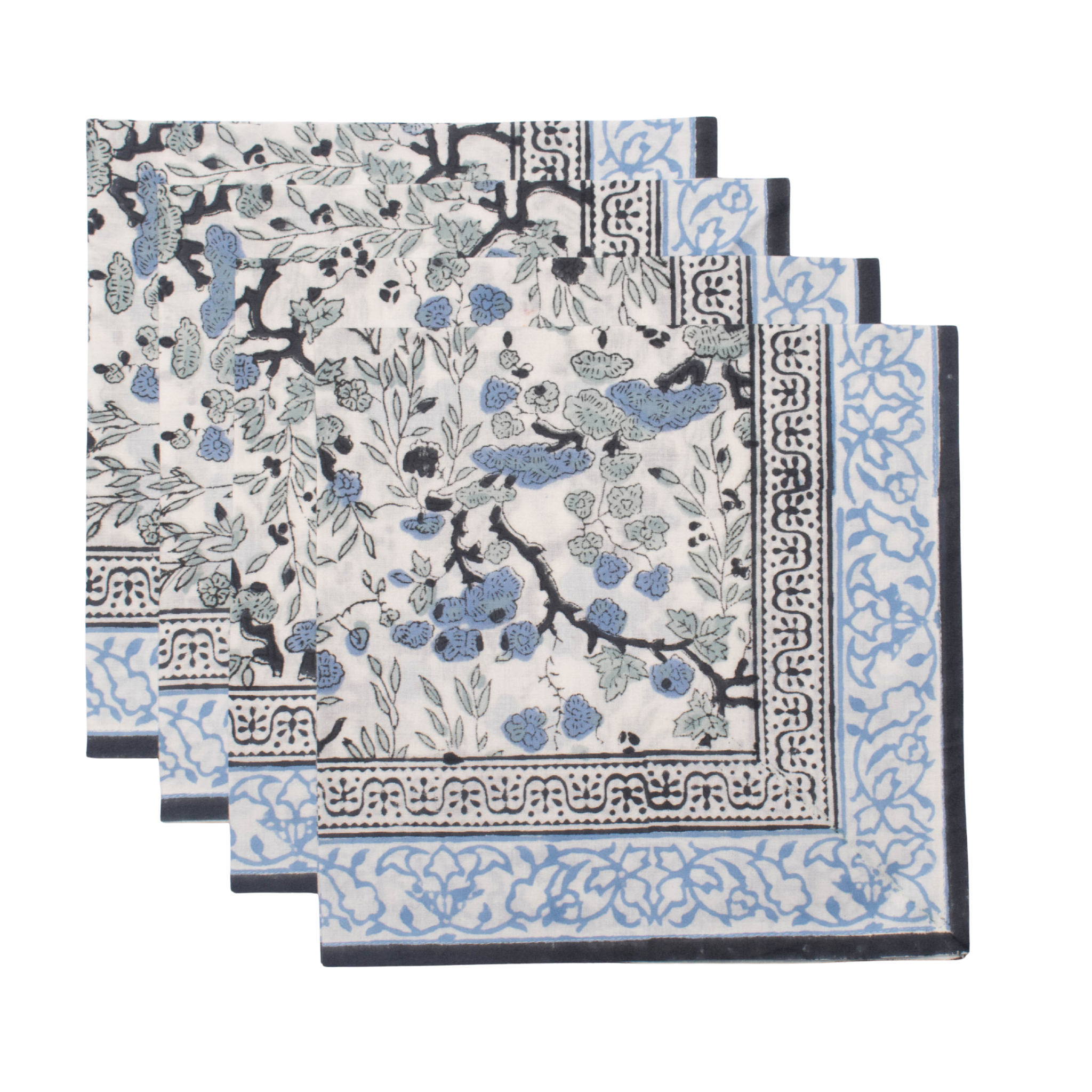 Set of four floral patterned napkins with blue and black design on a white background
