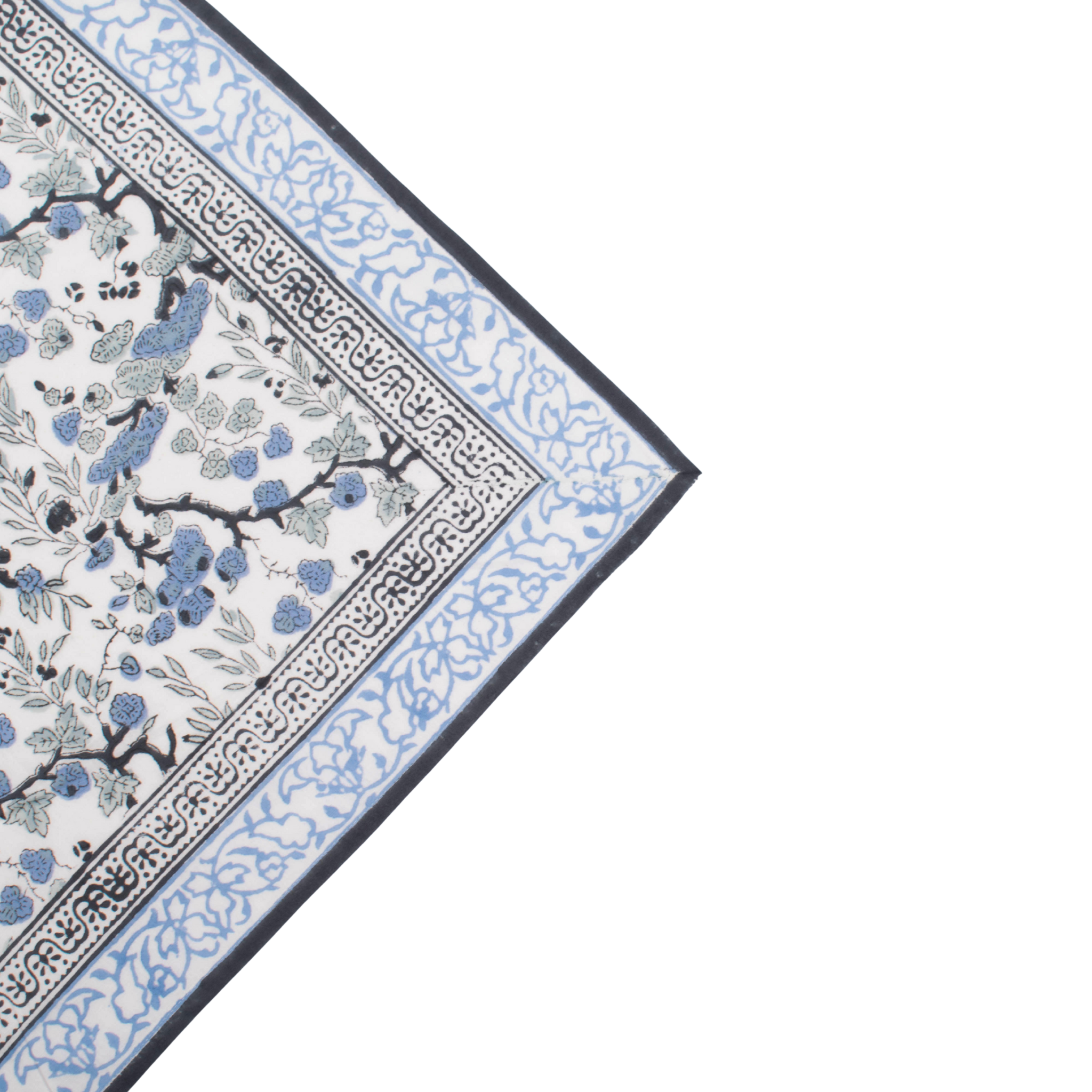 Decorative rug with floral and geometric pattern on a white background