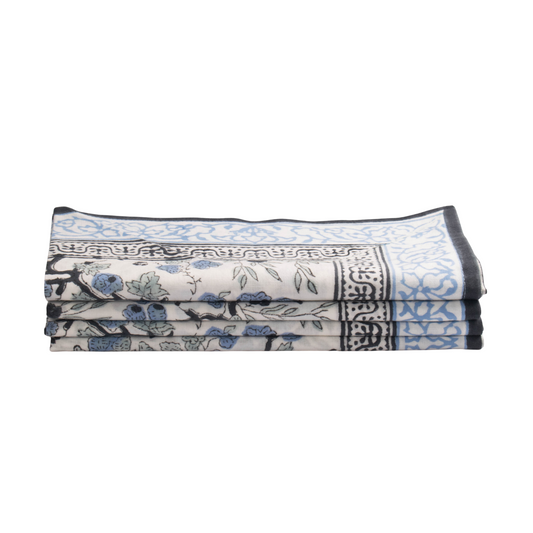 Folded fabric with floral pattern on a white background