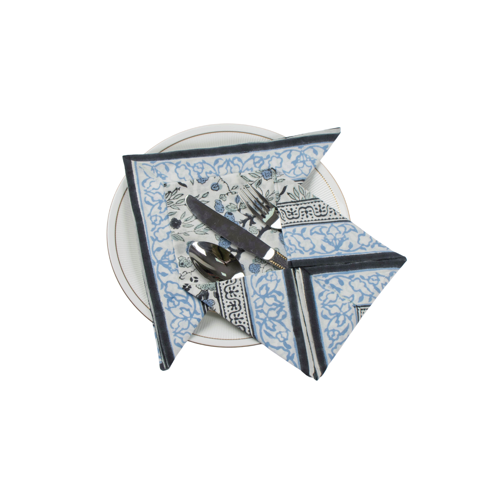 Decorative plate with blue and white pattern on a white background