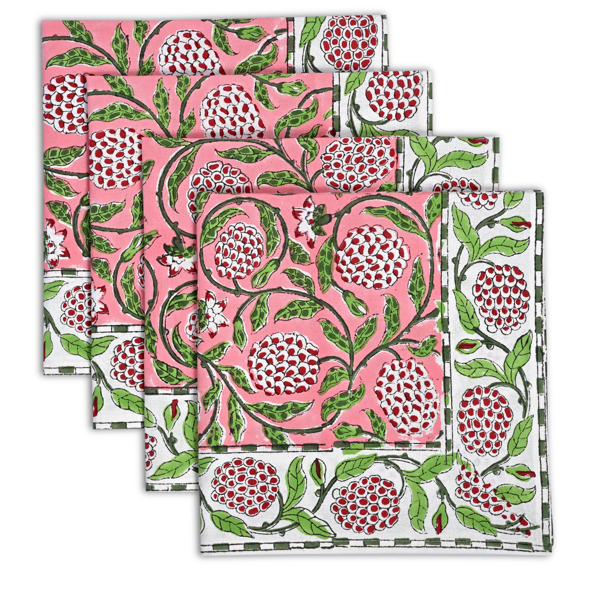 Set of four pink napkins with pomegranate and leaf pattern on a white background