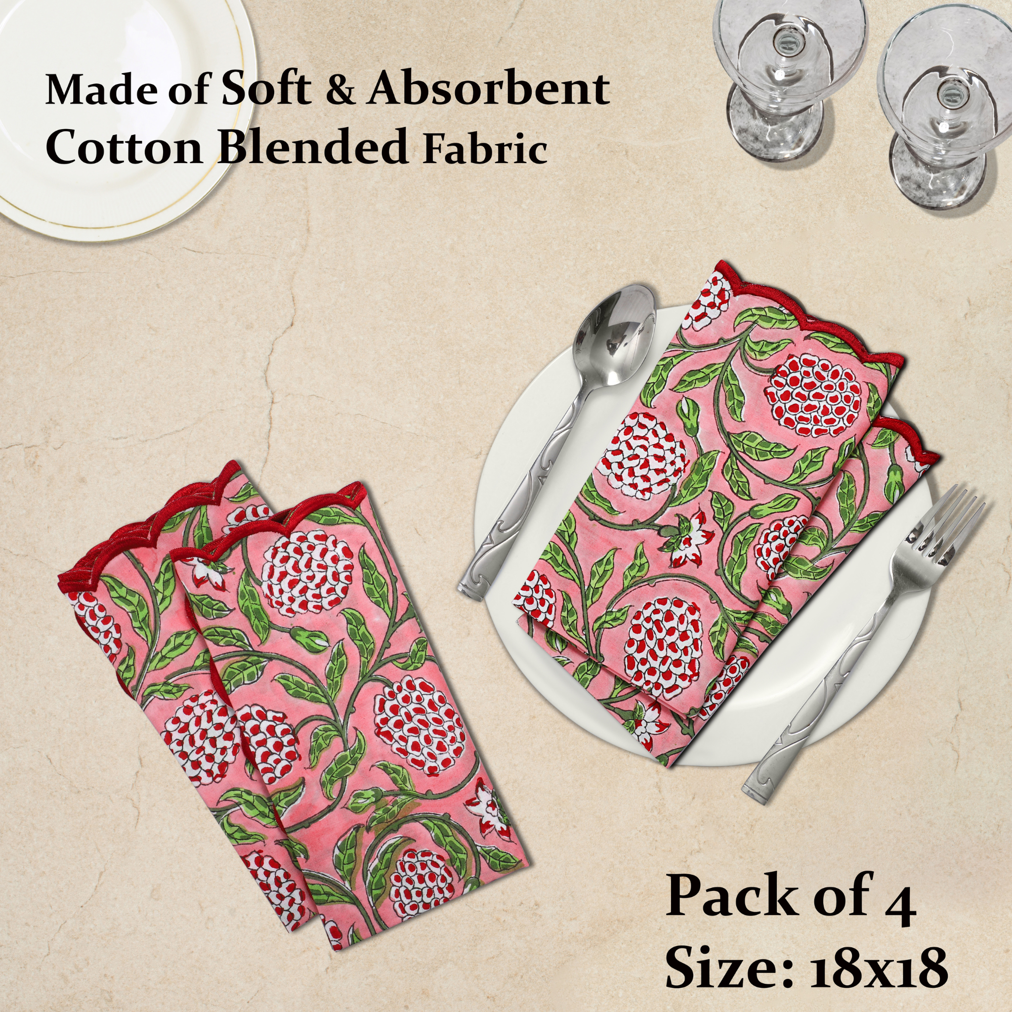 Set of pink floral patterned napkins on a beige surface with cutlery.