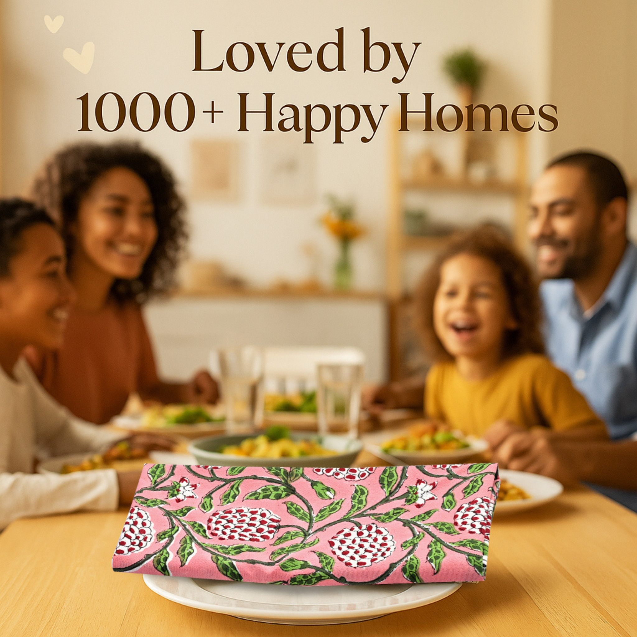 Family enjoying a meal together with a pink floral napkin on a table.