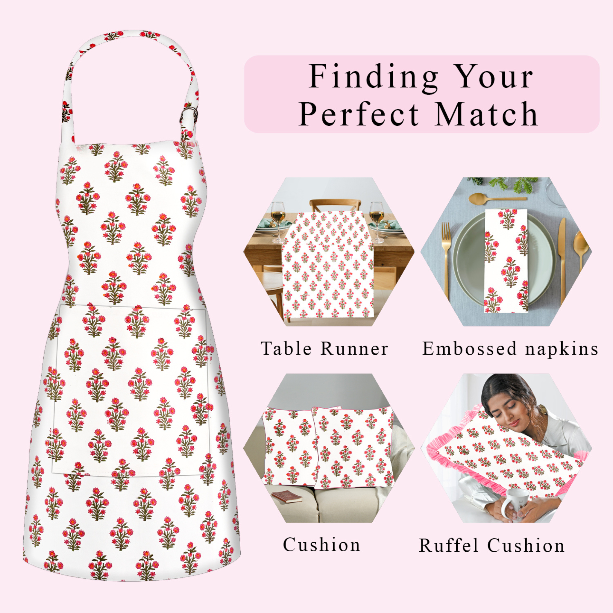 Floral apron with matching table runner, napkins, cushion, and ruffel cushion on a pink background.