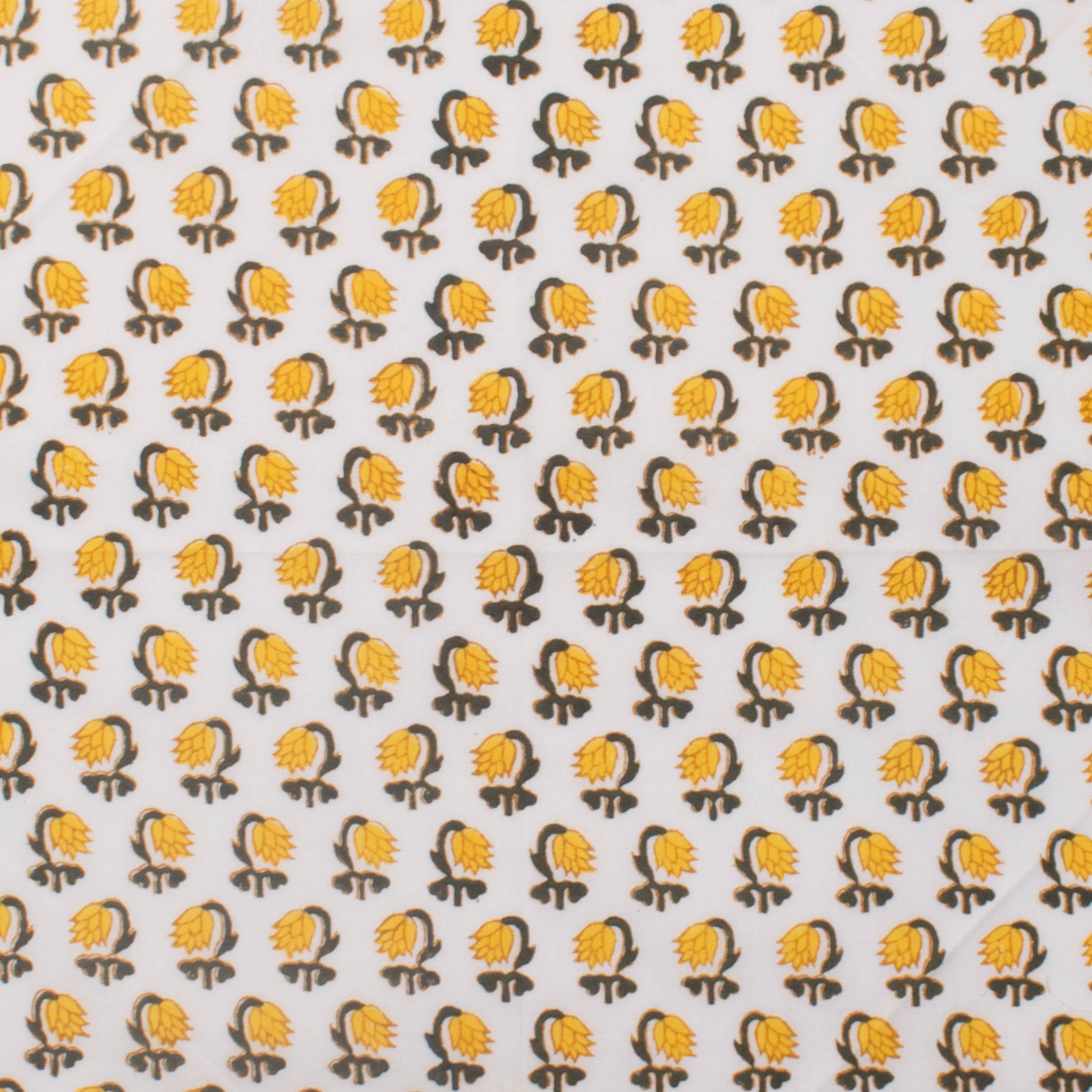 Pattern of yellow and black shapes on a white background
