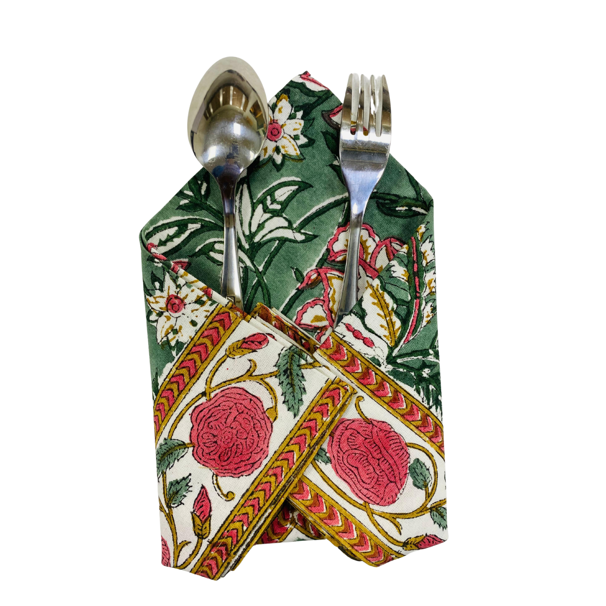 Floral patterned napkin with cutlery on a white background