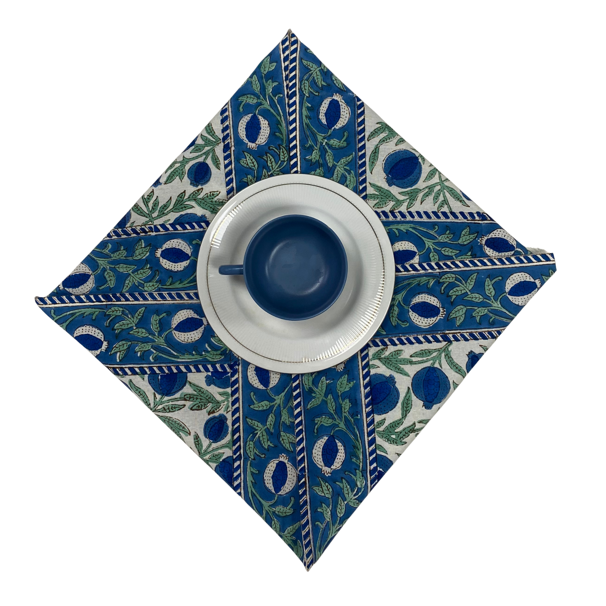 Decorative blue and green patterned napkin with a cup on a white background