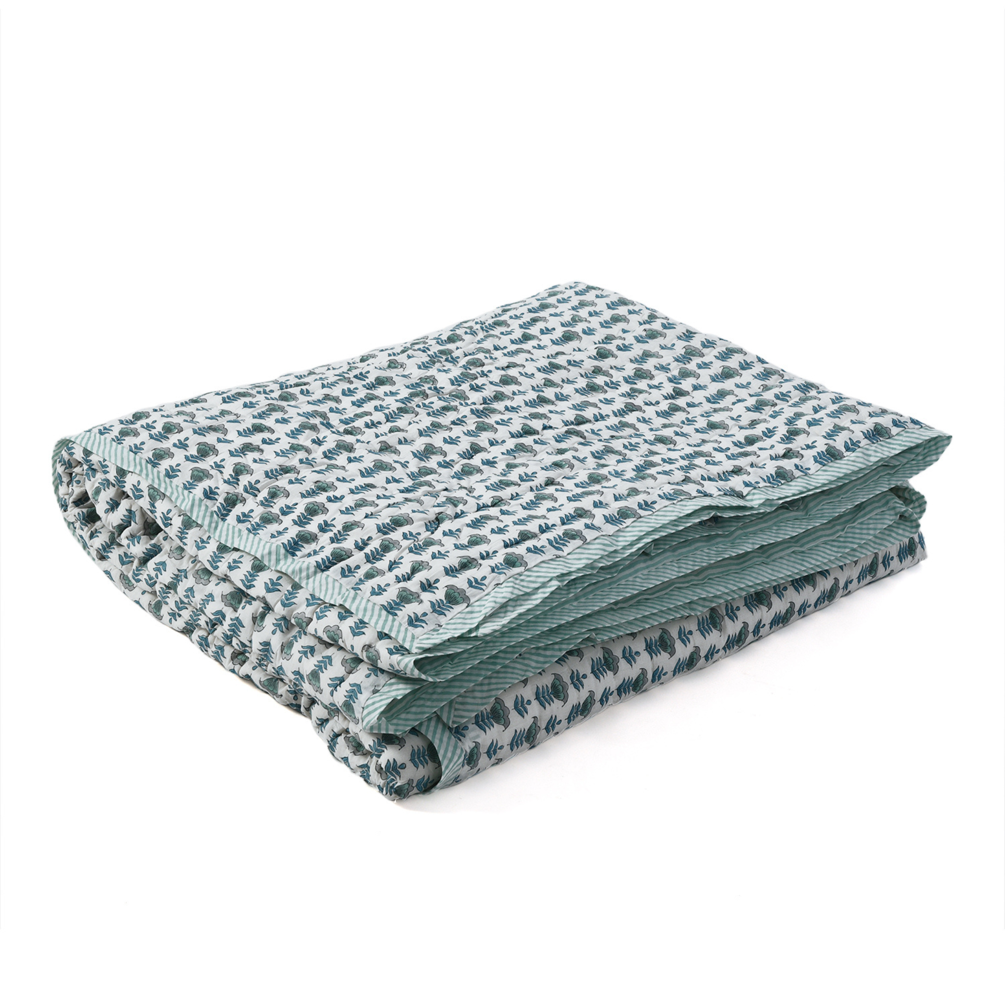 Folded fabric with a subtle pattern on a white background