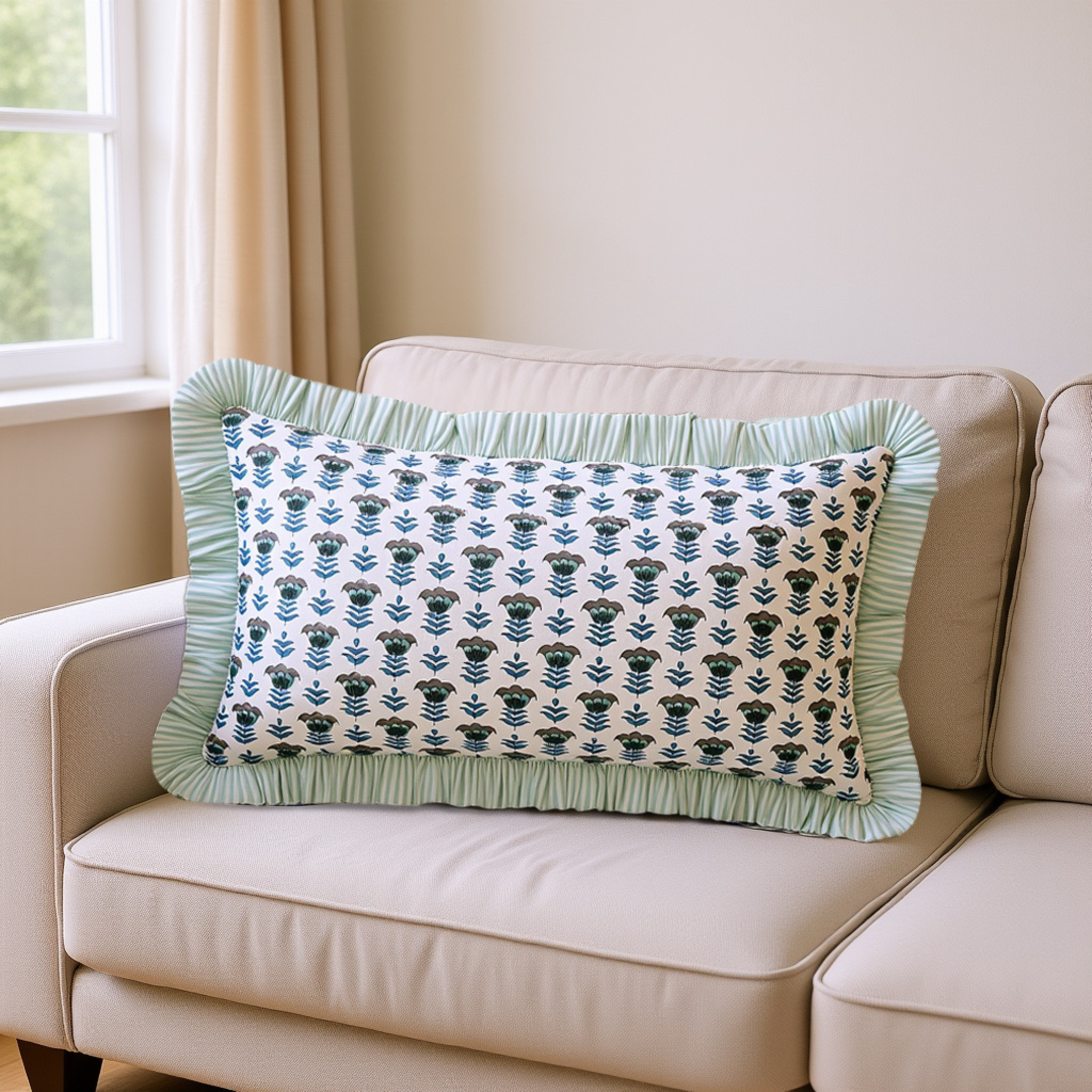 Decorative pillow with pug pattern on a beige sofa by a window.