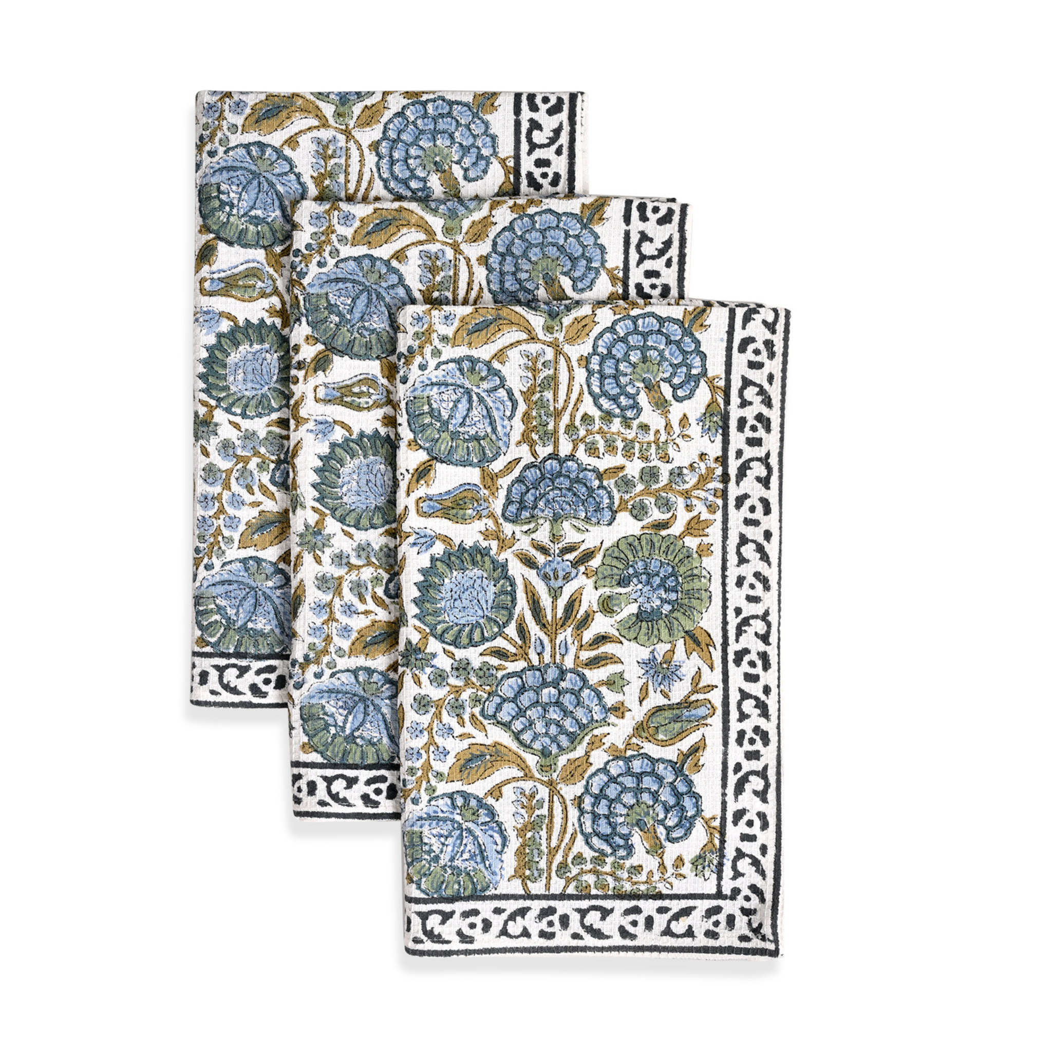 Set of three floral patterned napkins on a white background