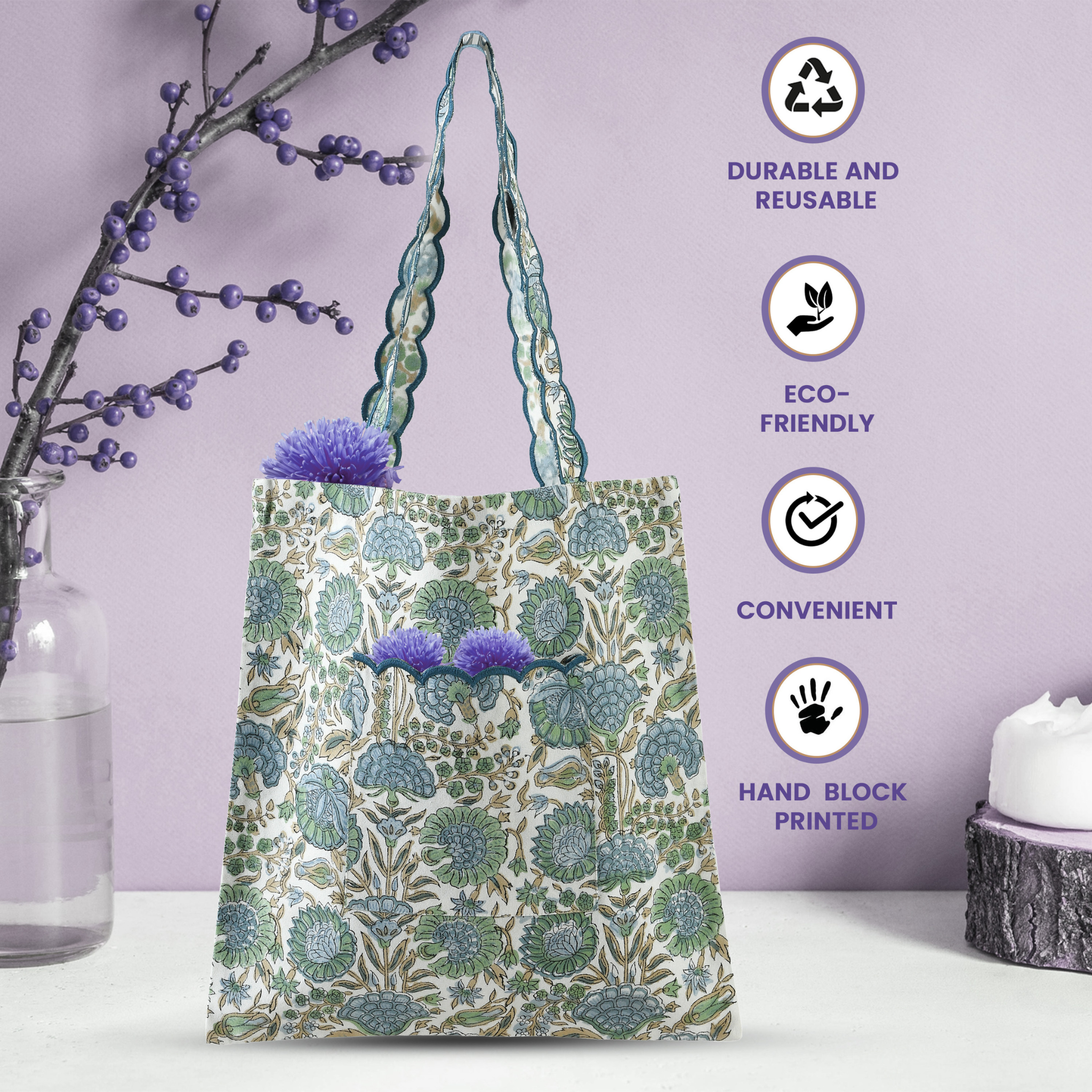 Reusable tote bag with floral design on a white surface with a purple background