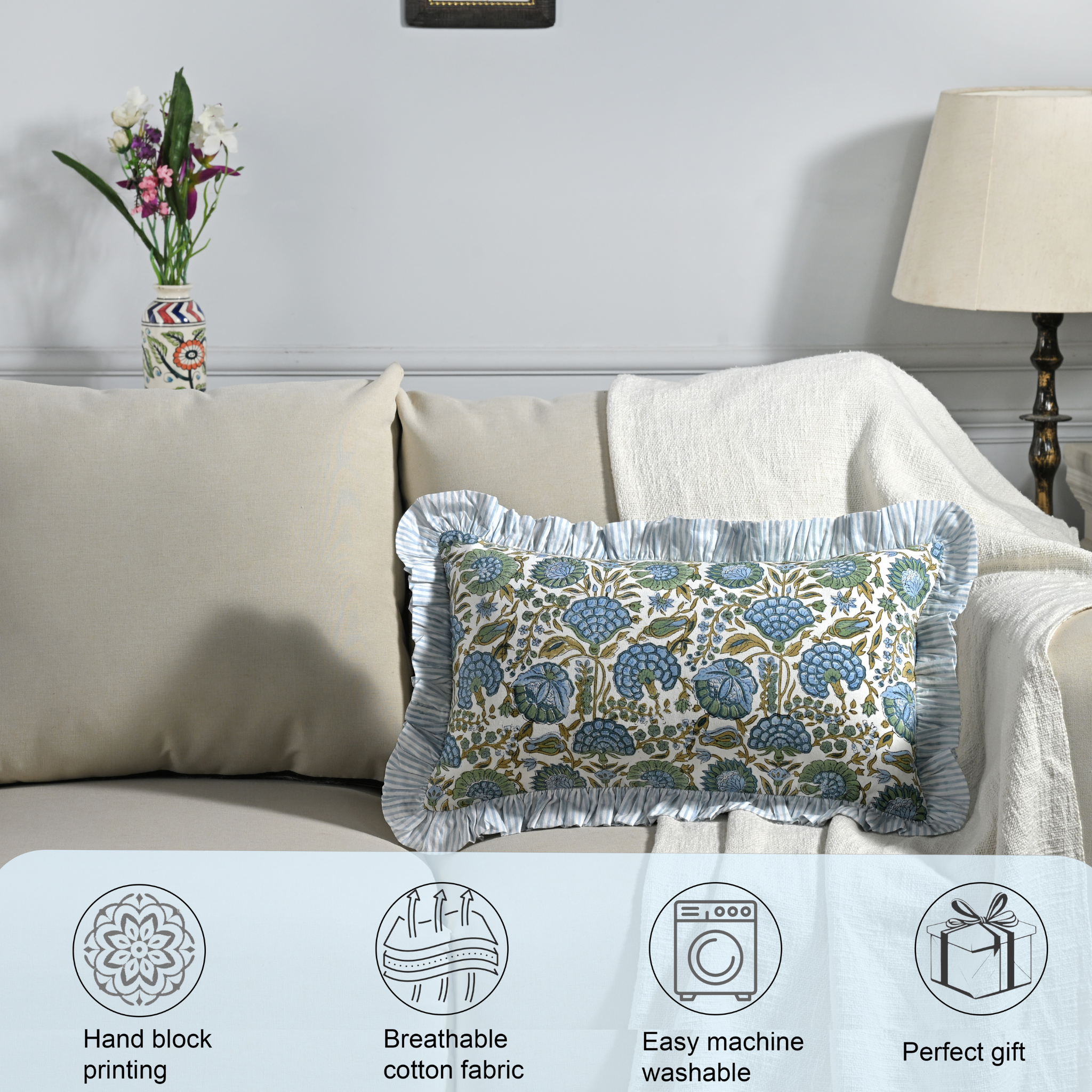 Decorative pillow with floral pattern on a sofa in a living room setting