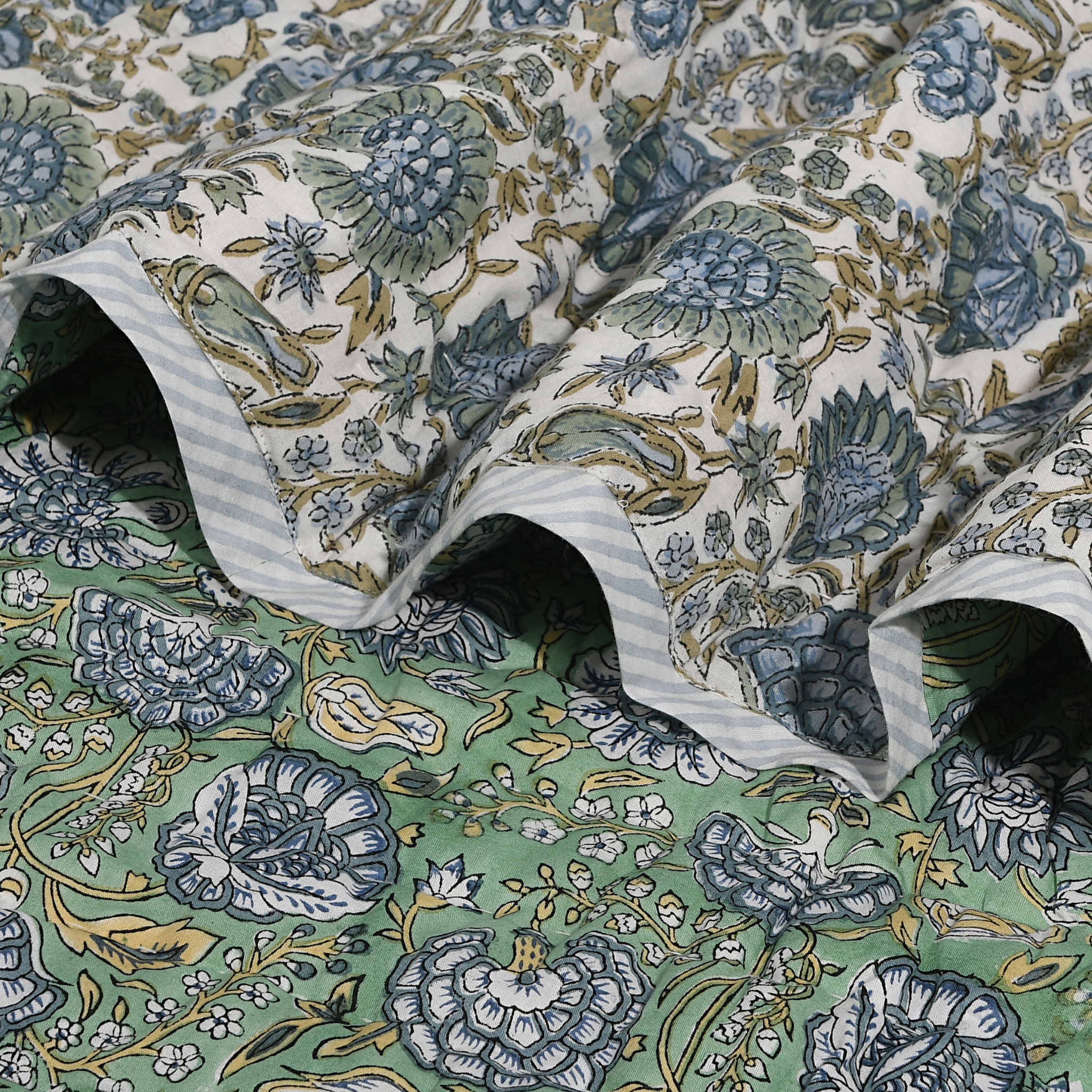 Floral patterned fabric with green and blue colors
