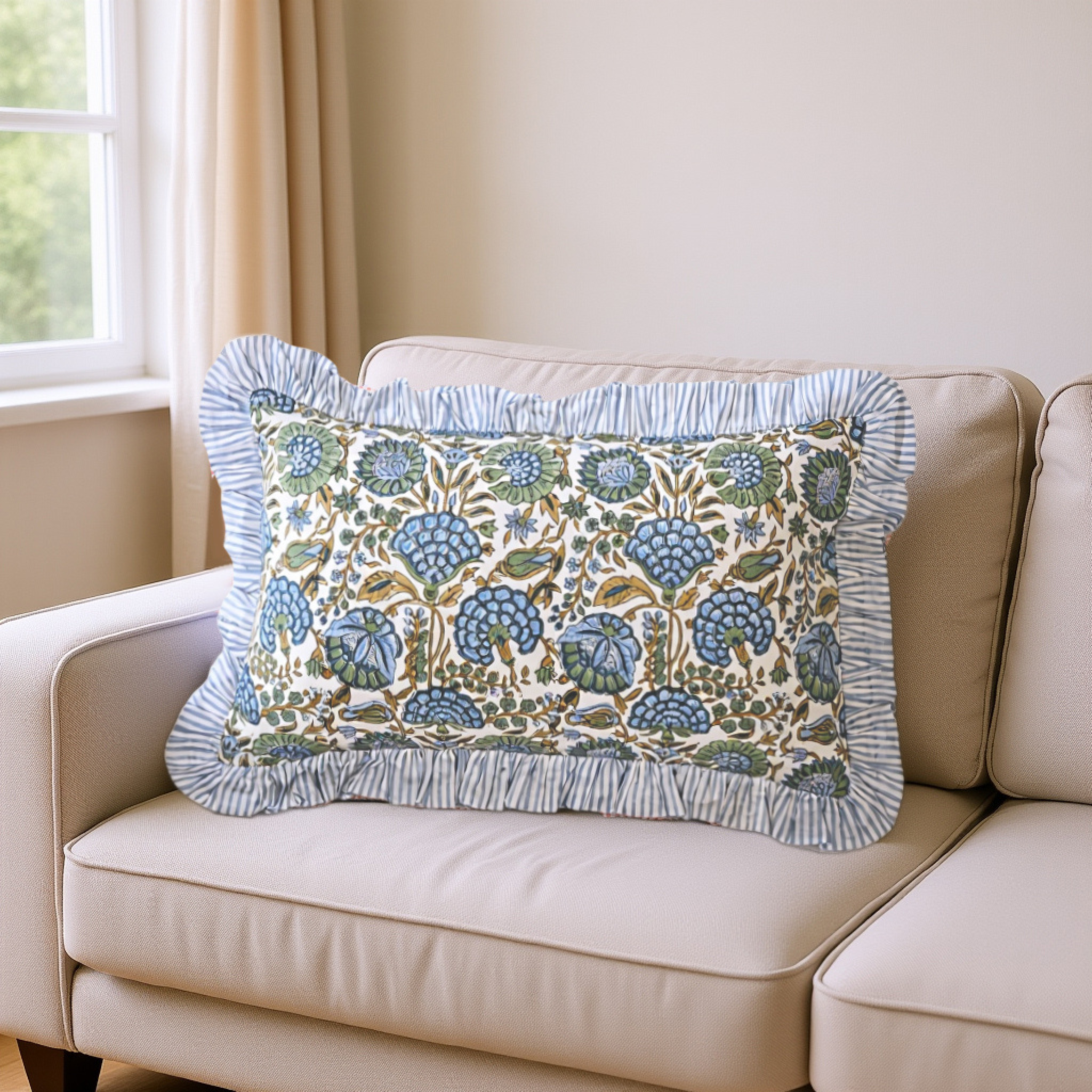 Decorative pillow with floral pattern on a beige sofa near a window.
