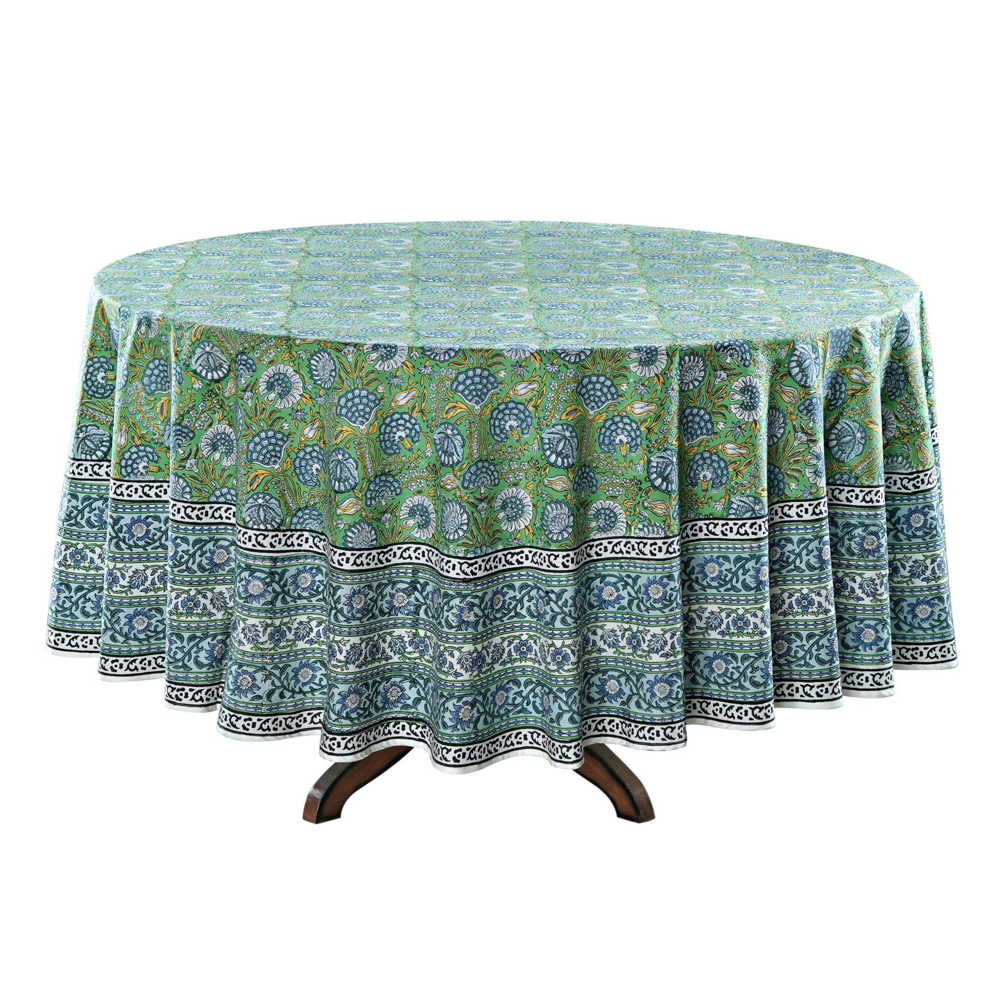 Round tablecloth with green and blue pattern on a white background