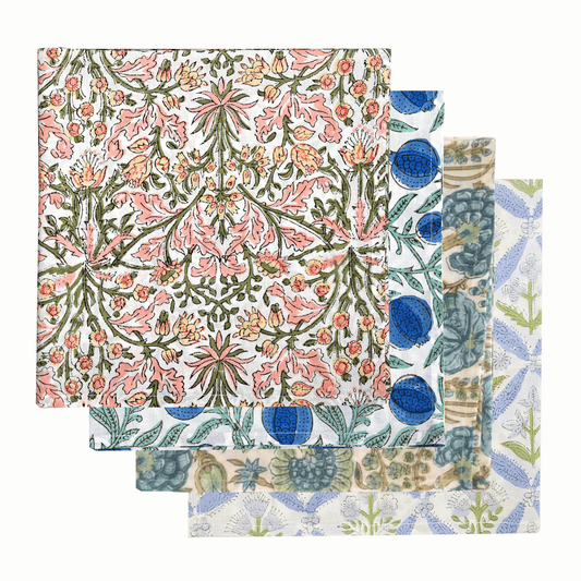 Set of three floral-patterned napkins with a white background