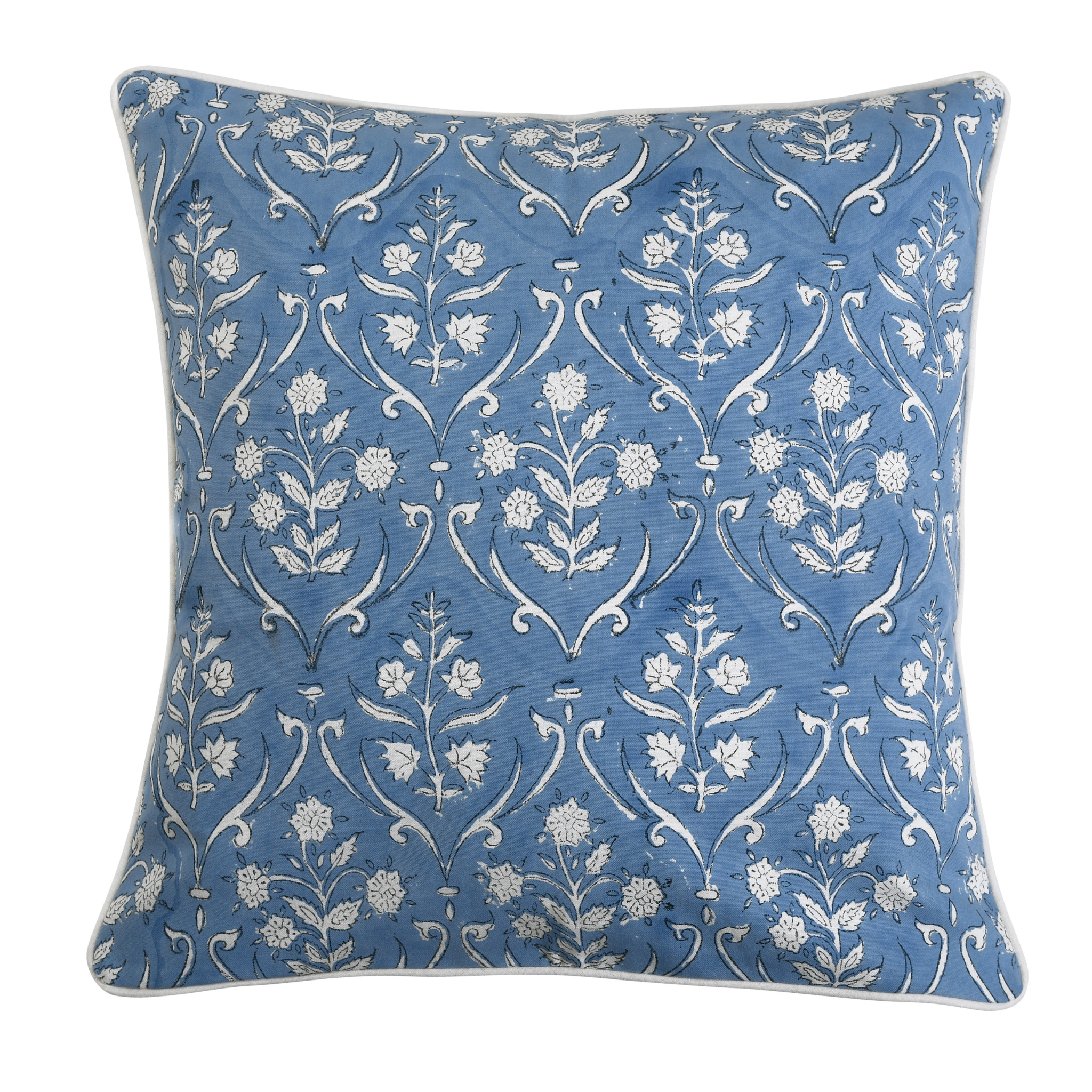 Decorative pillow with floral pattern on a blue background
