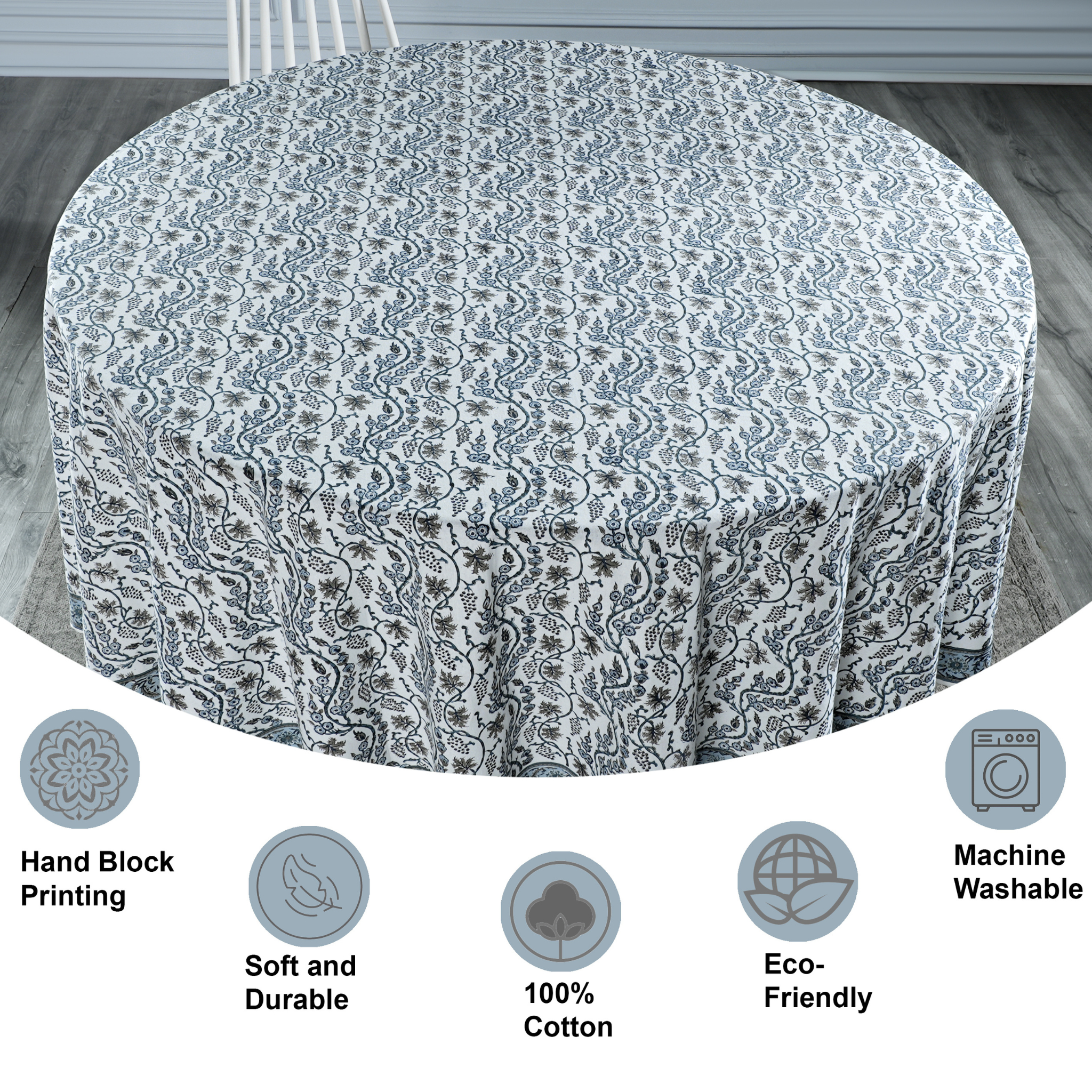 Round table with a patterned tablecloth on a wooden floor, with features highlighted below.