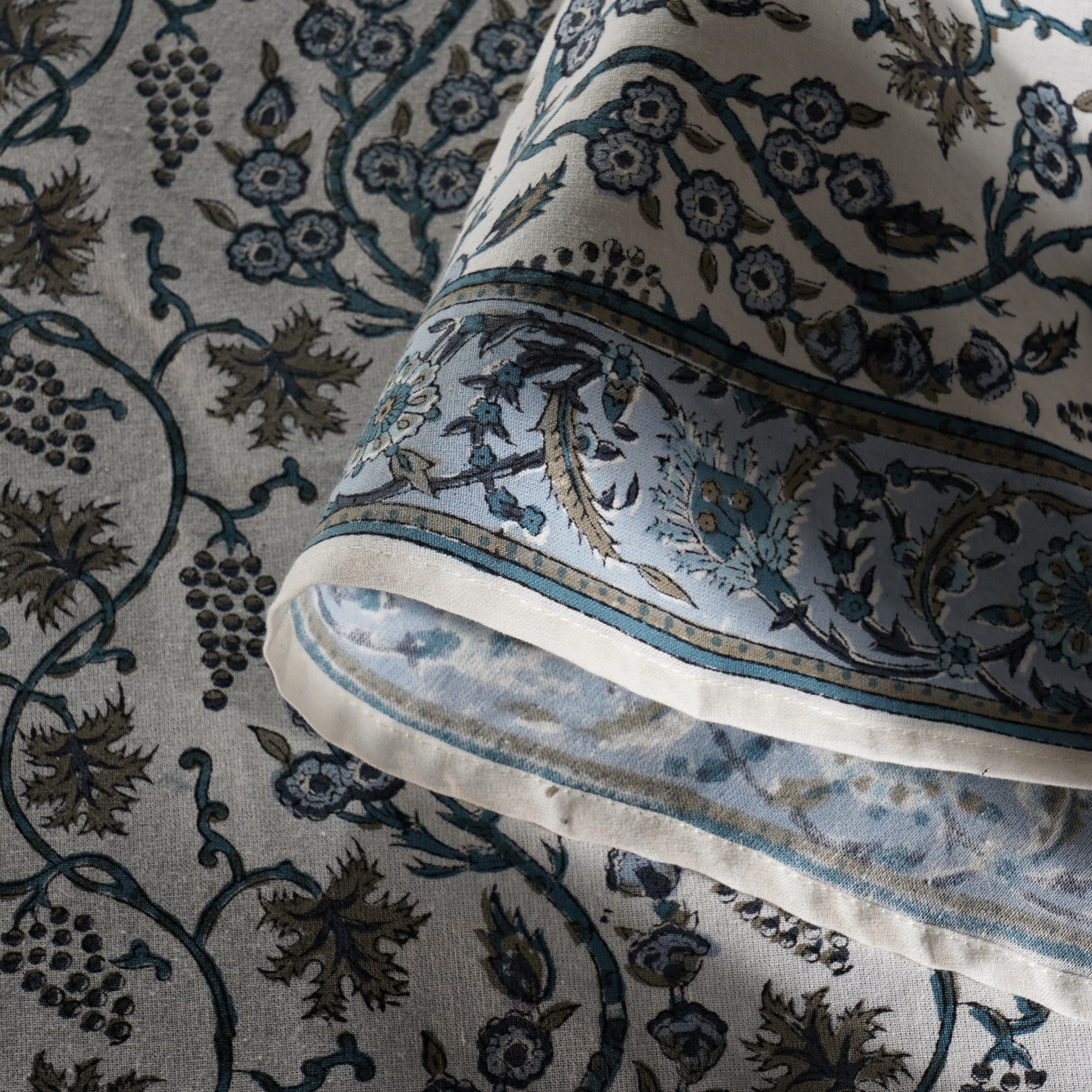 Close-up of a patterned fabric with intricate designs.