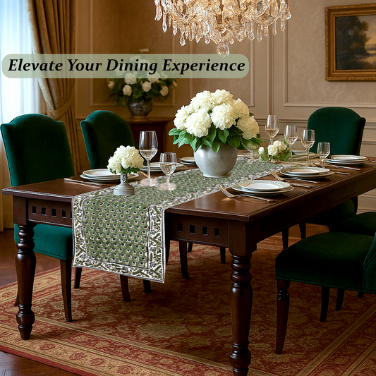 Dining room with a table set for dinner, flowers, and a chandelier.