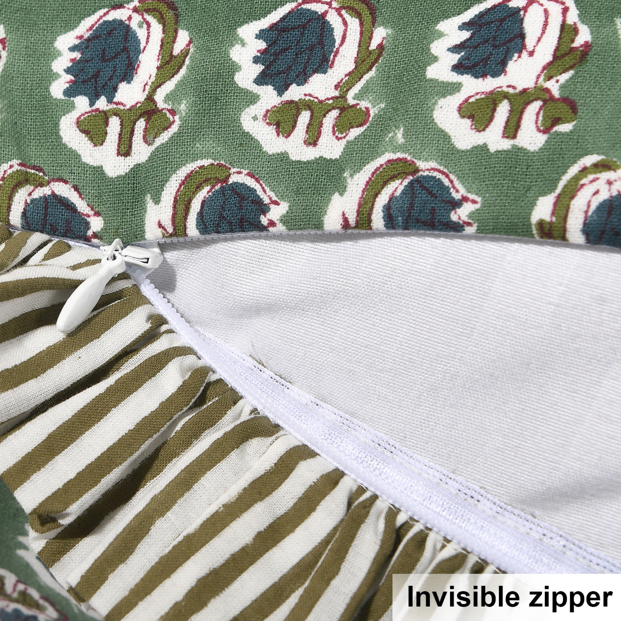 Fabric with floral pattern and striped fabric showing an invisible zipper.