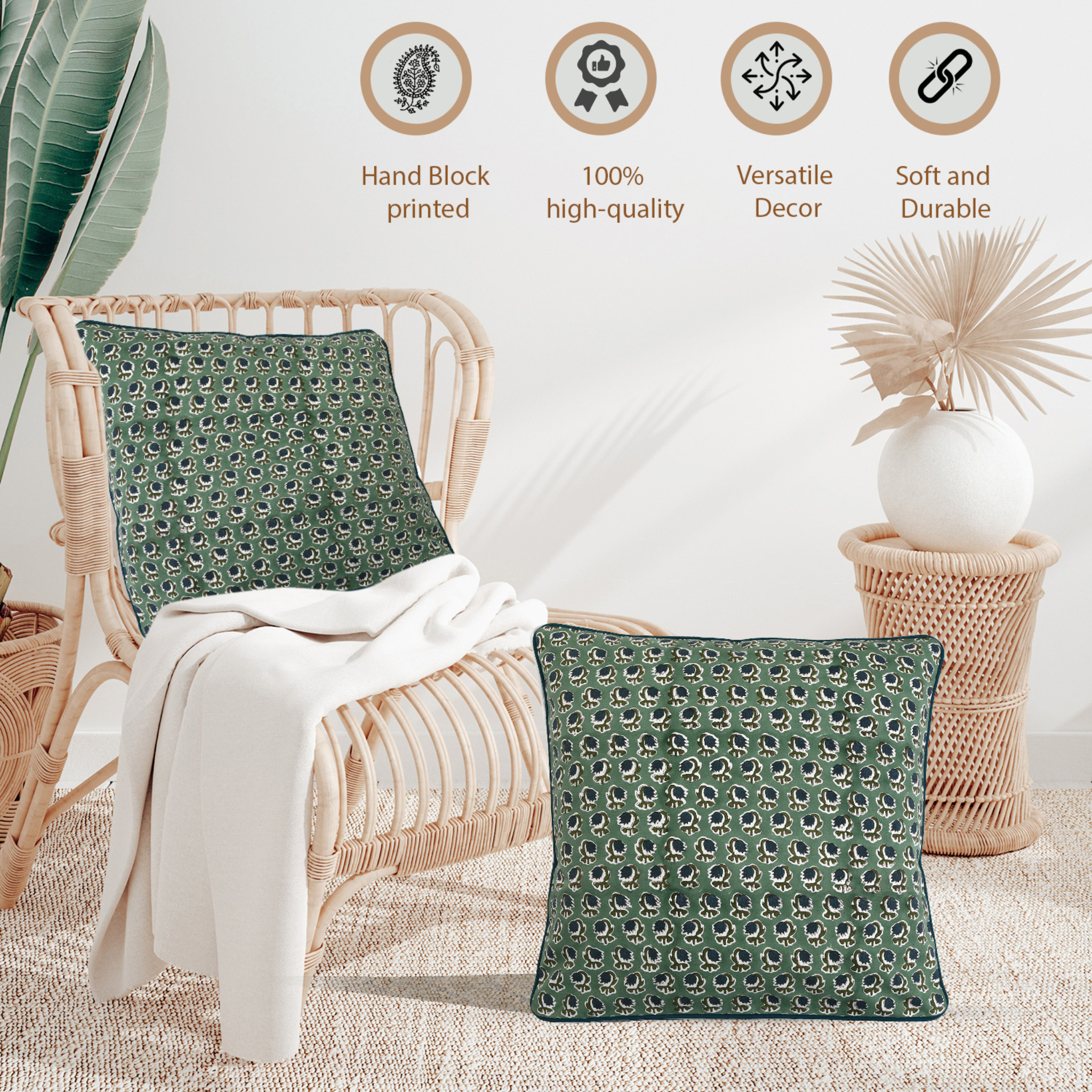 Green patterned pillow on a wicker chair with decorative elements in the background