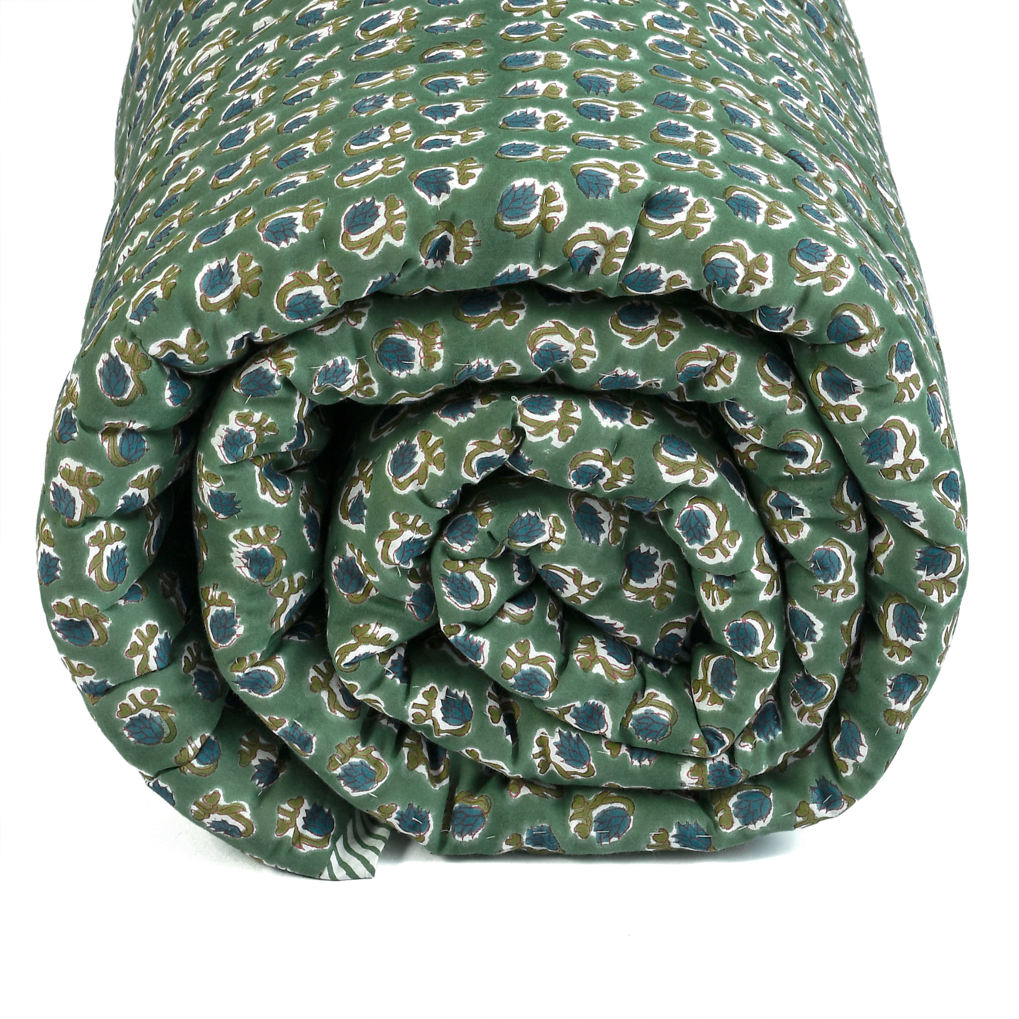 Rolled-up green fabric with a pattern on a white background