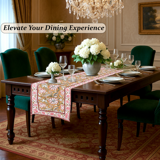Dining room with a table set for a meal, flowers, and elegant decor.