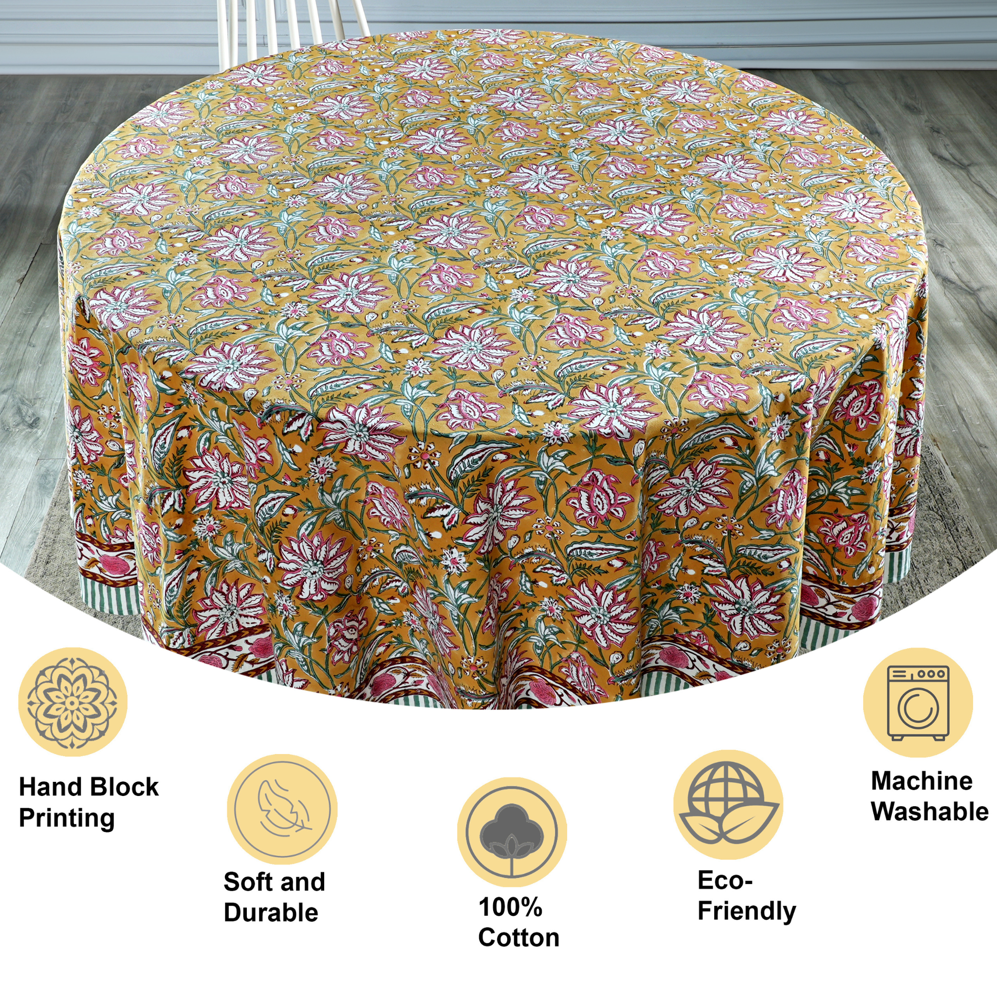Floral patterned tablecloth on a round table with features highlighted.