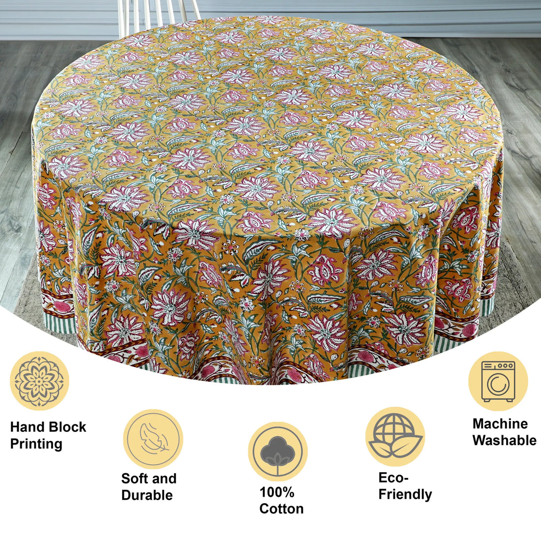 Floral patterned tablecloth on a round table with features highlighted.