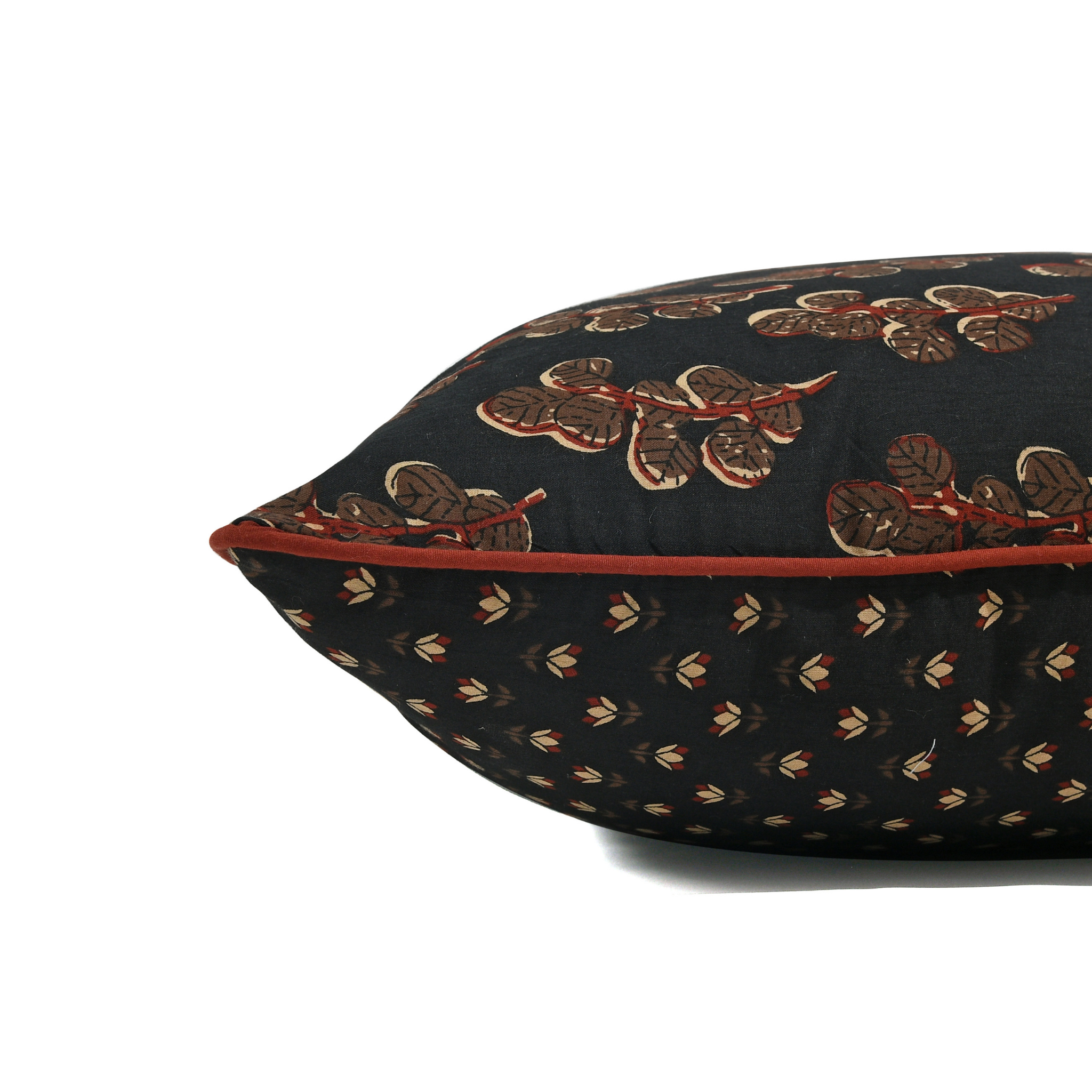 Decorative pillow with intricate patterns on a white background